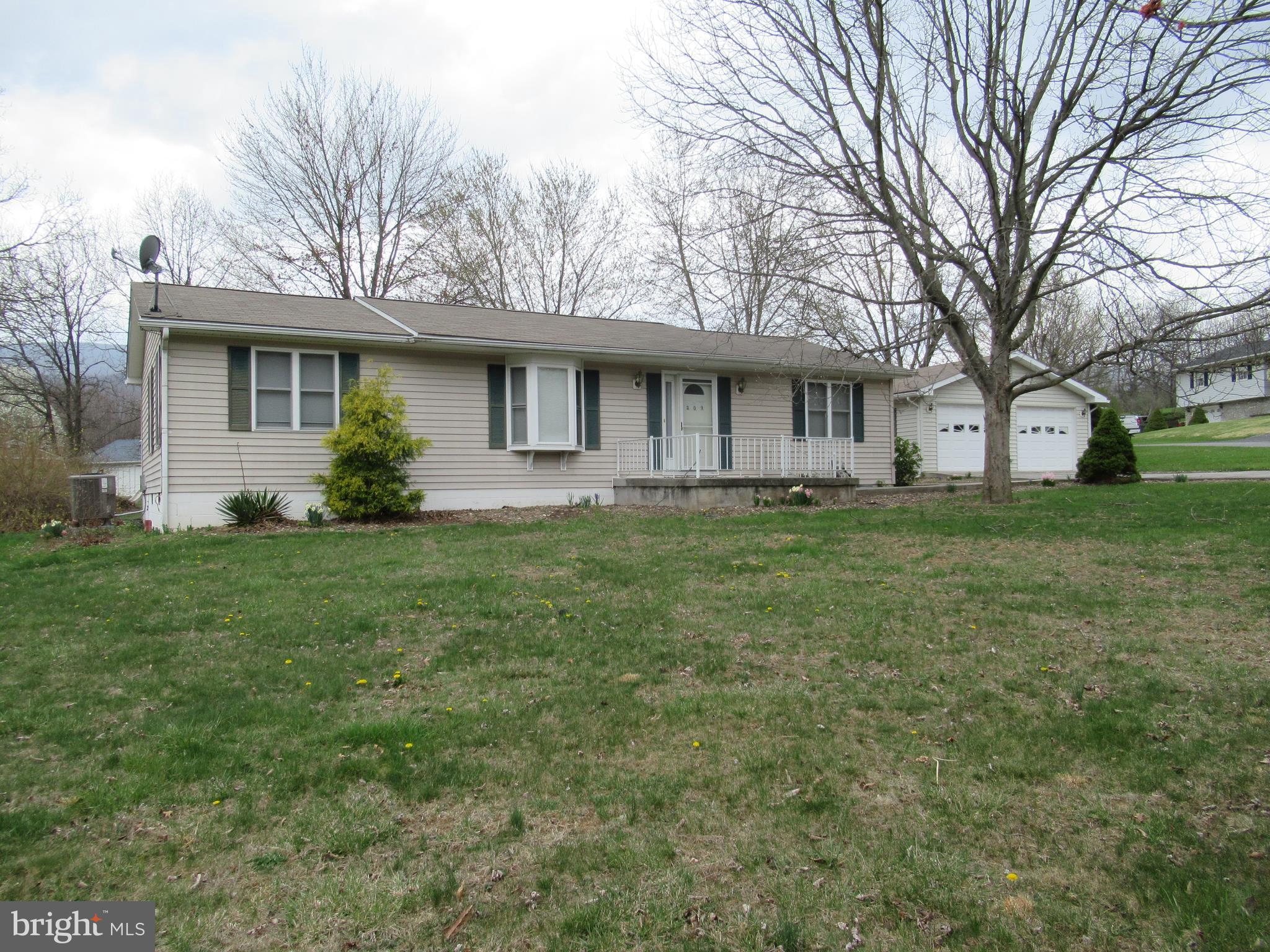 Three bedroom, two bath rancher on a corner lot in Healy Heights. Master suite is split from secondary bedrooms for added privacy. Large living room in the rear, overlooks the nice, flat, back yard. Large detached garage includes a workshop area with a pellet stove and a/c unit!