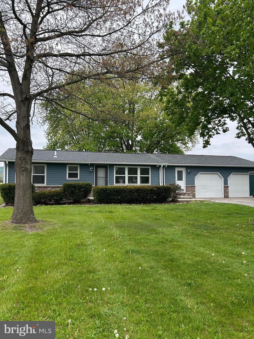 Remodeled 3-bedroom, 2-bath rancher located in Fairfield, PA. This home features a new roof, new siding, and a updated interior with new LVP flooring and fresh neutral paint throughout. The kitchen has been completely renovated with white cabinetry, quartz countertops, stainless steel appliances, farm sink and a gas stove. Washer and dryer are approximately one year old.
A spacious rear family room offers expansive views of mountains, fields, and sunsets. The property includes a level, nicely landscaped lot, an attached 2-car garage, and ample driveway parking. Public water and sewer. Conveniently located within walking distance to the post office and mini‑mart. Professional photos coming May 6th   This home is move‑in ready and priced to sell. Schedule a Showing for May 6th and on