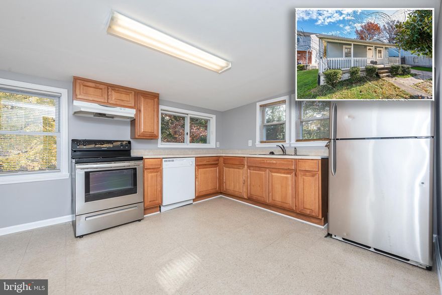 CHARMING PORCH FRONT RANCHER WITH LARGE REAR YARD!  Features include a spacious living room and separate dining room with wood laminate flooring, a large kitchen with space for a table and plenty of cabinet space, 2 main level bedrooms and 1 full bath, a full basement with a half bath - plenty of space to finish if more living space is needed, a large rear yard, and driveway parking!  Sold As-Is!