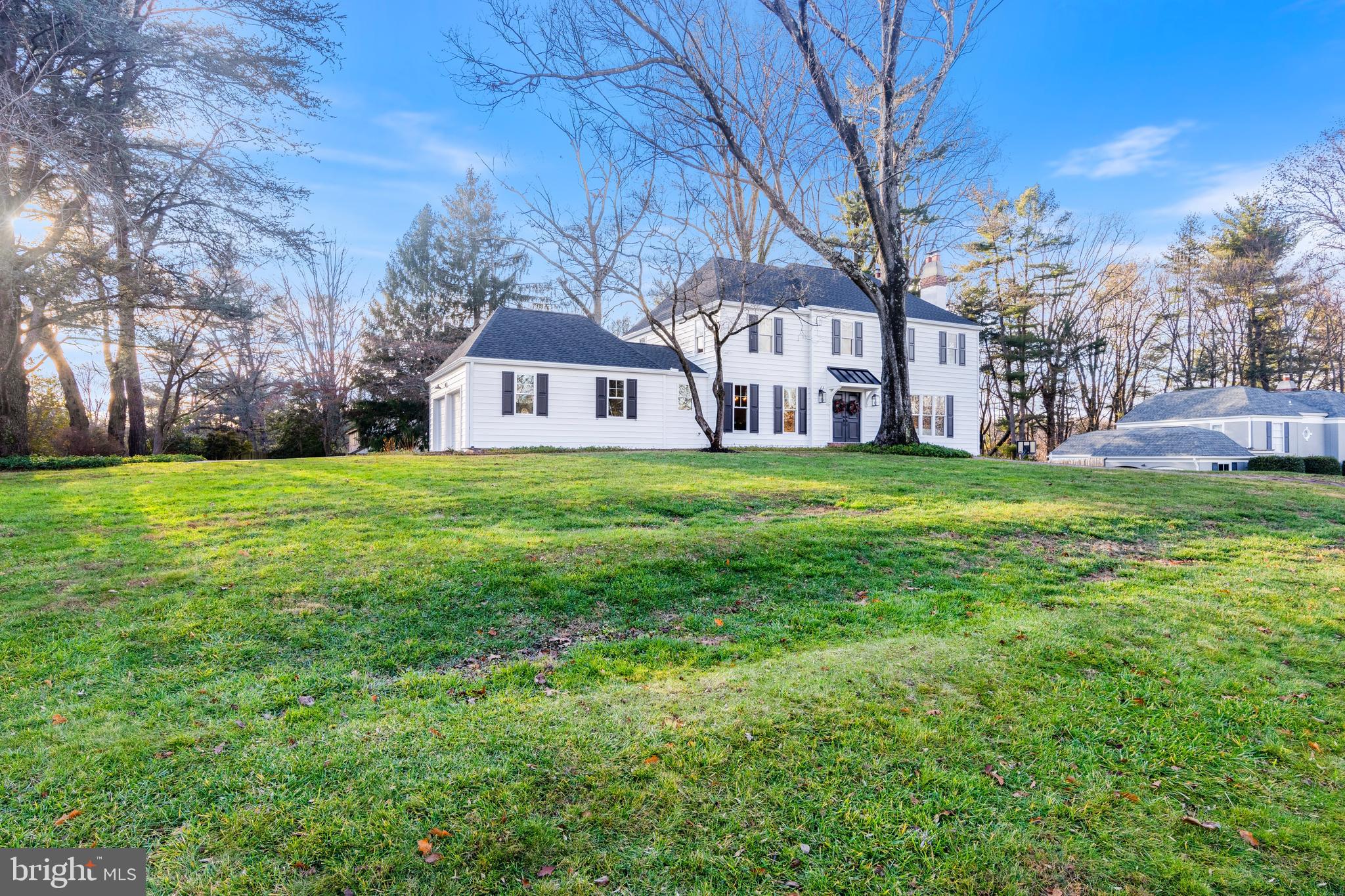 Step into luxury living at 715 Westover Road, a completely renovated home in the heart of Radnor Township. Located in the highly acclaimed Radnor School District, this property is on a quiet, double cul-de-sac street, perched beautifully on a corner lot.
Having undergone a top to bottom renovation inside and out, this 4 Bedroom, 2.5 bath, 3010 sq. ft. home feels like a brand new build, reimagined for today’s lifestyle. You are welcomed from the moment you step inside. Abundant natural light floods this center hall colonial, accentuating original arches above each doorway and brand new hardwood floors throughout, creating an inviting atmosphere and seamless flow between living spaces. The entire rear of the main floor was opened up to create fabulous gathering spaces. The heart of the home is the gourmet kitchen. It is adorned with high-end finishes, from wood flooring to white shaker-style cabinets, a double-thick quartz center island with seating for 5-6, subway tile backsplash and professional grade appliances, along with microwave drawer and under counter wine/beverage fridge. The 2 car garage, with new doors, empties right into the sizable mudroom/laundry area with custom built in full of coat hooks, shelves and a bench. The kitchen connects to a completely open concept breakfast / informal dining area, adjacent to the inviting, cozy family room with wood burning fireplace and built-in bookshelves. Step outside to the totally redone screened porch and classic flagstone patio overlooking the expansive private back yard, offering the most exquisite sunsets. The welcoming front foyer connects to a private powder room and large coat closet, as well as the beautiful living room/den with large windows, with views of the expansive front yard and another wood burning fireplace. The formal dining room completes the first floor space beautifully.
The second floor offers privacy and comfort for the entire family with a primary suite and 3 additional bedrooms, including a stylish hall bath with a penny tile floor, double vanity and subway tile tub walls. Unwind in the primary suite that has it all! It was designed to incorporate an enormous walk-in closet and a spa-like, ensuite bathroom with a double marble vanity, large walk-in shower with a product nook hidden from sight, and loads of natural light. The primary suite also boasts a 2nd closet for overflow. The upstairs landing includes a linen closet and the pull down attic steps, also great for additional storage.
Adding to this home’s comfort and functionality, the walk-out lower level, flooded with natural light, goes beyond expectations. Boasting ample windows, faux wood flooring, two additional storage closets and a dedicated home office space, this space is designed for both relaxation and productivity.
On the exterior of the home, you will witness a striking curb appeal transformation with the removal of all stucco, replaced by contemporary siding and stylish shutters, as well as a new windows and roof that add a fresh, modern aesthetic to the property. Also notable, PECO is currently replacing and upgrading underground electrical service in the Green Countrie neighborhood. These enhancements will reduce outage durations and improve electrical and fire safety.
This special property is nestled on a fabulous community street, in a serene enclave, offering the peace and privacy found in the unique double cul-de-sac setting, on a sprawling .8-acre flat lot with mature trees. This completely renovated, move-in ready home checks all the boxes for today’s discerning buyers.