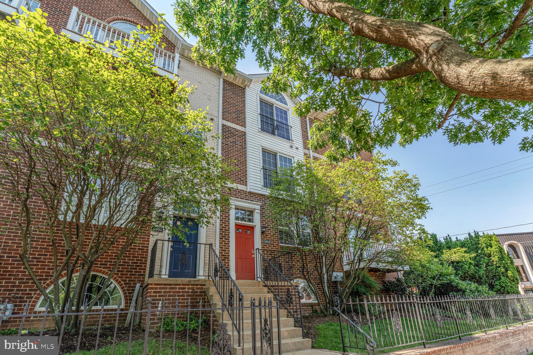 Welcome to this spacious, UPDATED bright 3 bedroom 3 1/2 bath listing in Arlington Ridge Terrace featuring a 2 car garage. Main level features a large country style kitchen & dining/living room with HW floors, a gas fireplace & powder room. 2nd level laundry & 2 spacious bedrooms each with their own ensuite baths. 3rd level retreat is a huge MBR with vaulted ceilings, 2 walk in closets,  large ensuite bath with walk in shower, separate soaking tub, and 2 separate sink/vanity areas. Lower level  basement area with entry/exit to your 2 car garage. This beautiful home offers convenient access to WDC, and is walking distance to shopping, restaurants, grocery stores, bike/run trail & much more!