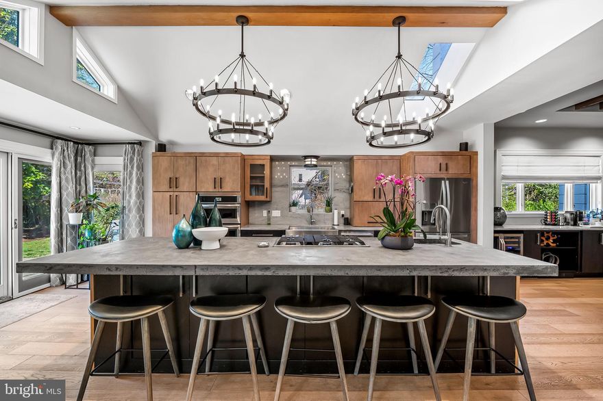 Welcome to the home you have admired for years. The epitome of Roland Park. From the luxurious wrap-around front porch, to the over half-acre of lawn, to the red slate roof, this home has everything you admire and love about Roland Park. Every room makes a statement and is designed for everyday living. Substantial renovations and additions create open spaces that are perfect for entertaining. Gather fifty of your closest friends and relatives time and again and there will always be enough space. Recent updates include a mud room, basement water proofing, exterior irrigation system, exterior lighting, interior lighting, outdoor kitchen, and more. With five bedrooms, four and a half baths, and multiple family rooms, this is a comfortable home for everyone. Many original details shine, such as the staircases, leaded glass windows, and more. Come fall in love with 4502 Roland Avenue.