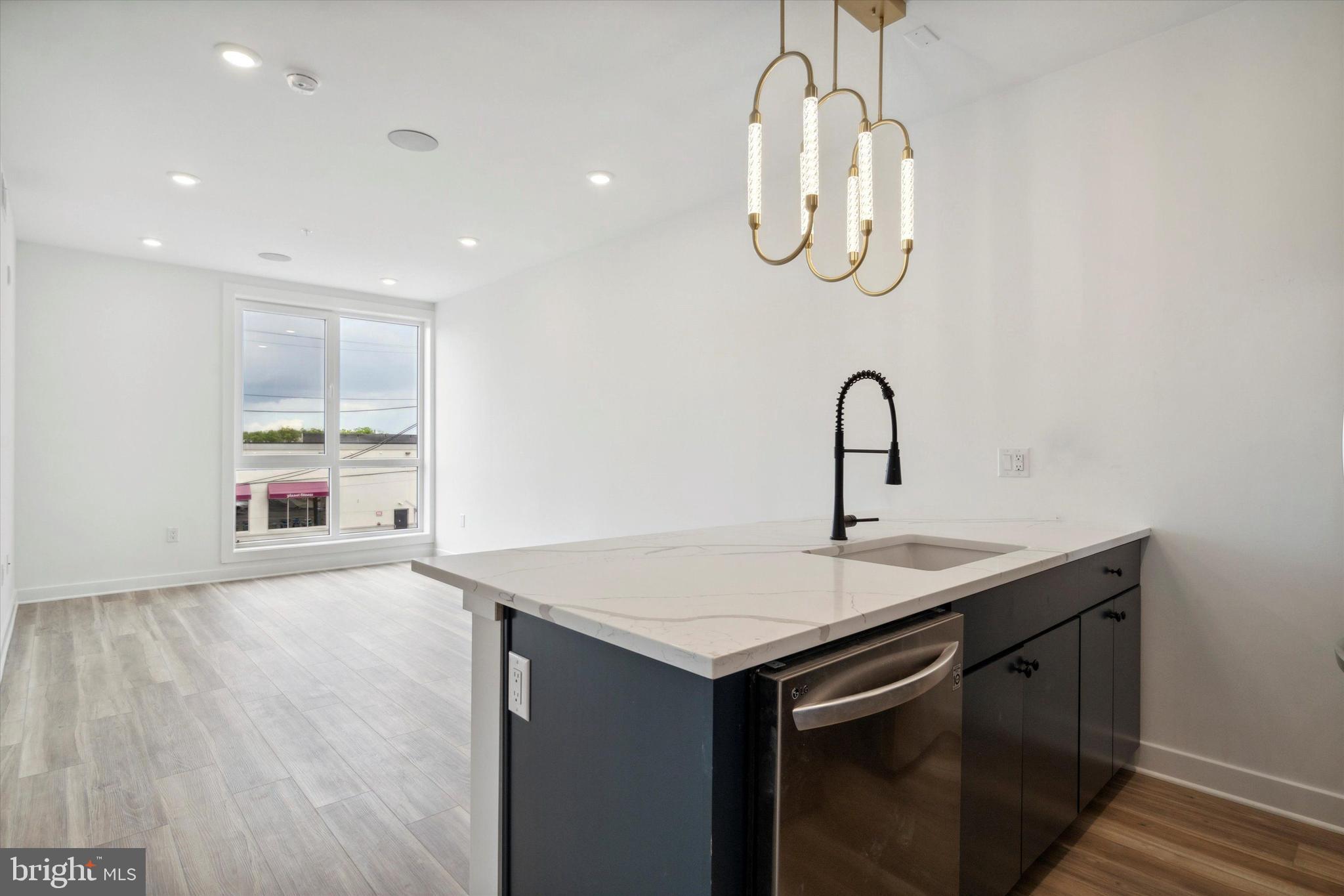 Welcome to The Lenora, Fishtown’s newest luxury apartment building located at 2636 York St. The modern 42-unit community flawlessly combines modern living with practical amenities to create an urban sanctuary.
The Lenora offers a variety of convenient amenities to accommodate your busy lifestyle. Tenants have access to the 38-car garage, complete with an electronic underground lift system to make parking a breeze. The building is complete with a spacious furnished lobby, offering a package room and access to bike storage.
Choose from a mix of contemporary junior one-bedroom, full-size one-bedroom, two-bedroom, and penthouse three-bedroom units, each thoughtfully designed to complement the building's modern aesthetic. Enjoy stunning panoramic views of the city from the fully furnished communal outdoor spaces.
The Lenora provides residents with the perfect blend of style, convenience, and comfort. Experience the vibrant Fishtown community today and make the most of your living experience.