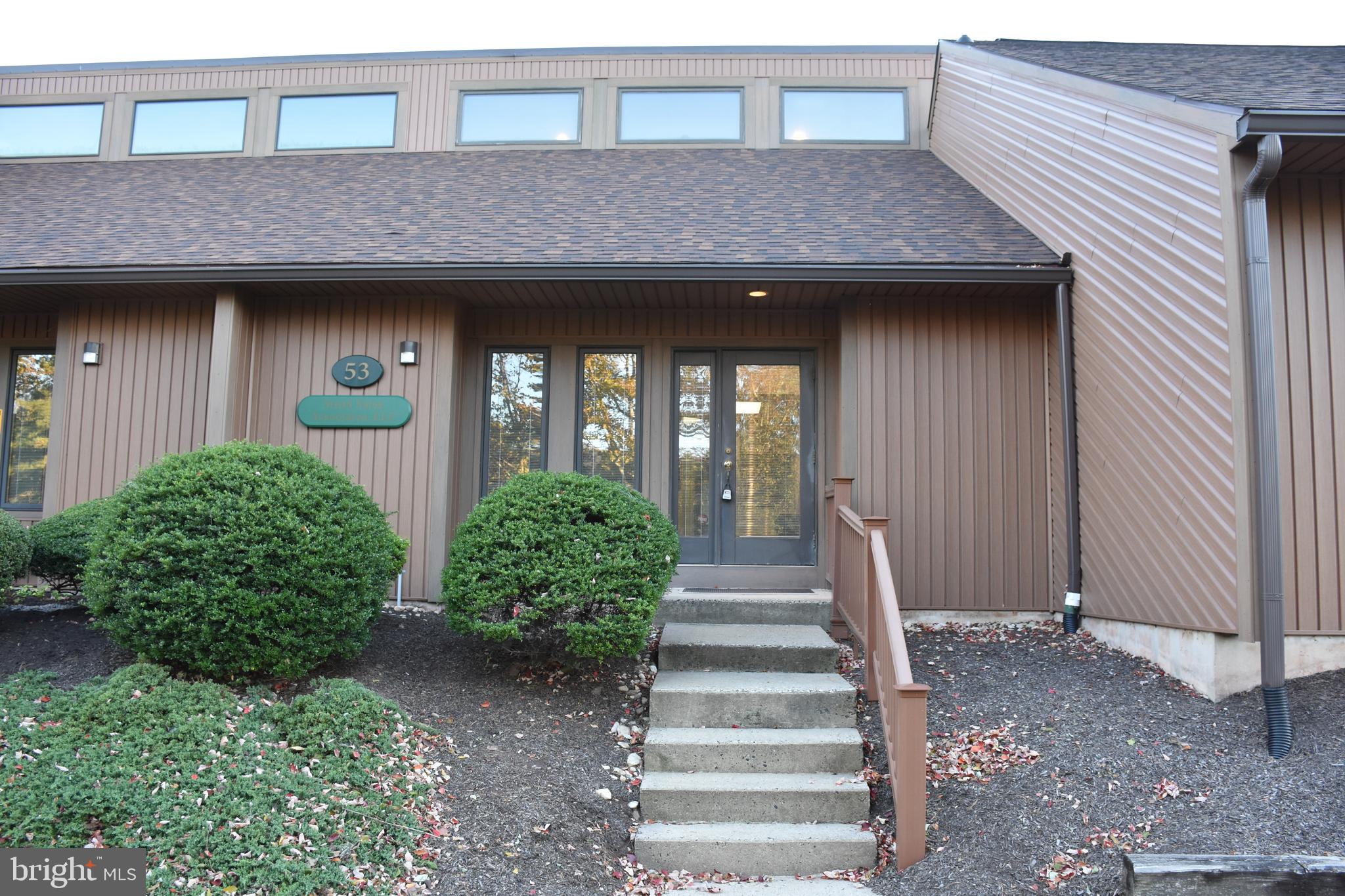 Versatile commercial/office space for sale. This property features an expansive entry with vaulted ceilings and waiting area with a conference room loft overlooking the lobby. The skylights let in a soft light that makes for a pleasant, bright working environment. The main room has plenty of space for multiple desks or one large reception counter. There are three separate offices, not including the conference room, two of which have several large windows. The unit also includes a powder room and a full basement with tons of storage space. Make this the new home for your thriving business! Call for an appointment today.