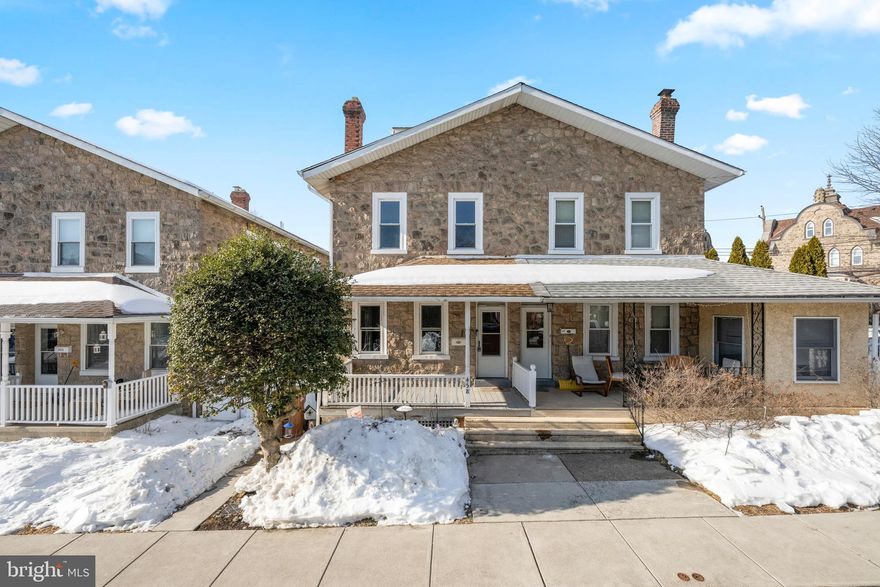 Charming stone home in the heart of Ambler, set within the highly sought-after Upper Dublin School District and offering the rare convenience of two-car off-street parking. Not offered to the market in over 50 years, this home has long been a true staple in the community—once known for hosting holiday gatherings and spirited Philly sports celebrations. A sweet covered front porch welcomes you inside to a warm living and dining room combination highlighted by beautiful custom built-ins lovingly crafted by the current owners. The kitchen opens to the deck and backyard, creating easy indoor-outdoor flow and everyday ease with private parking just beyond. Upstairs features three bedrooms and one full bath, while the attic awaits your vision—an ideal opportunity to create additional living space. Full of character, history, and possibility, this home is ready for its next chapter.