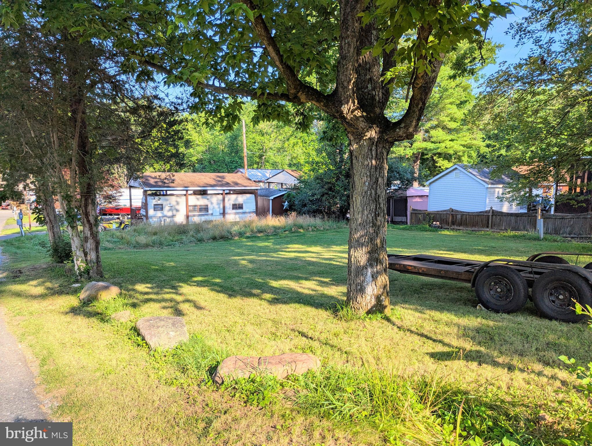 These Lots are ready to move onto. Lots are being sold together only and are side by side one another. These lots are ready to make your own, bring your camper and start living the river life. *** This is a gated community so you need to enter at the guard shack. Entry is not permitted without ID per the office rules. Bring ID's to the office or guard shack for visitor pass. THIS IS A SEASONAL CAMPGROUND! OPEN FROM APRIL 1 TO NOVEMBER 1. ** WELCOME TO RIVER BEND/SEASONAL LOT AVAILABLE TURN KEY** River Bend is a privately owned 400 acre recreational- vehicle camp resort with seasonal activities for members, families and guests. This great RV park is tucked away on the Upper Potomac River of West Virginia, River Bend is one of West Virginia's most popular family seasonal destinations. . Just a short drive from the Washington and Baltimore metro area. Open with utilities from April 1 to November 1. Lot owners have access to their property the entire year. *** Members Enjoy *** * Amazing views and wildlife, Potomac River access, Trails, Swimming pools, Mini-Golf, Youth center, Tennis and basketball courts, laundry facilities, convenience store, deli and lounge. *Bath houses through out the park, boat ramp, bar and grill and even a church located on the grounds. River Bend also hosts numerous activities such as 4th of July fire works, small carnival, bonfires, poker runs, horse shoe tournaments, car show, Halloween Trick or Treat and so much more. Come and check out this amazing lot **** Lets bring an offer to to table!