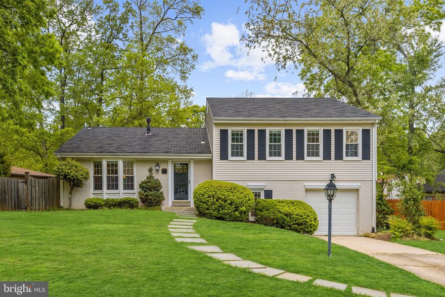 Welcome to 8803 Stonehaven Court, nestled at the top of a quiet, cul-de-sac in the sought-after Highland Stone neighborhood. This beautiful four bedroom, two-and a half-bathroom home is flooded with light and charm. This move-in ready home offers 3000+ square feet of ideal living space.Enter the welcoming entry foyer and enjoy warm hardwood floors and crown molding detail running throughout the entire main level. Sunny, updated windows flood the spacious living room with natural sunlight. The renovated kitchen features an abundance of white cabinetry, generous silestone countertop space, stainless steel appliances, cast iron sink, a walk-in pantry and an eat-in-space wrapped in windows. Other features of the main level include a formal dining room with chair rail molding detail and an updated chandelier.On the upper level of the home is a very spacious master suite with an updated master bathroom with designer ceramic tile and walk-in closet. Three other generously sized bedrooms and a shared renovated hall bathroom with dual vanity are also on this level. The fully finished and newly carpeted lower level hosts a large family room with wood-burning fireplace and custom designed mantle, laundry room, updated power room and an oversized recreation room. The family room features French doors leading to the large, fully fenced, backyard offering private views, flat and grassy space and bluestone patio. An attached garage and driveway provide generous parking space. Don't miss this wonderful home in a fantastic location!