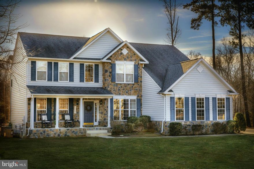 Incredibly oversized and upgraded-No expense spared. Gorgeous stone fireplace, enormous kitchen w/upgraded cabinets & loads of granite, master bath w/soaking tub & separate dual head shower w/body massage jets, expansive finished basement: rec room, possible guest area & bath. 2 car det. gar. w/ heat, A/C, cable & phone.  20 x 44 dark gunite pool with automatic cover, built in hot tub & trex deck.