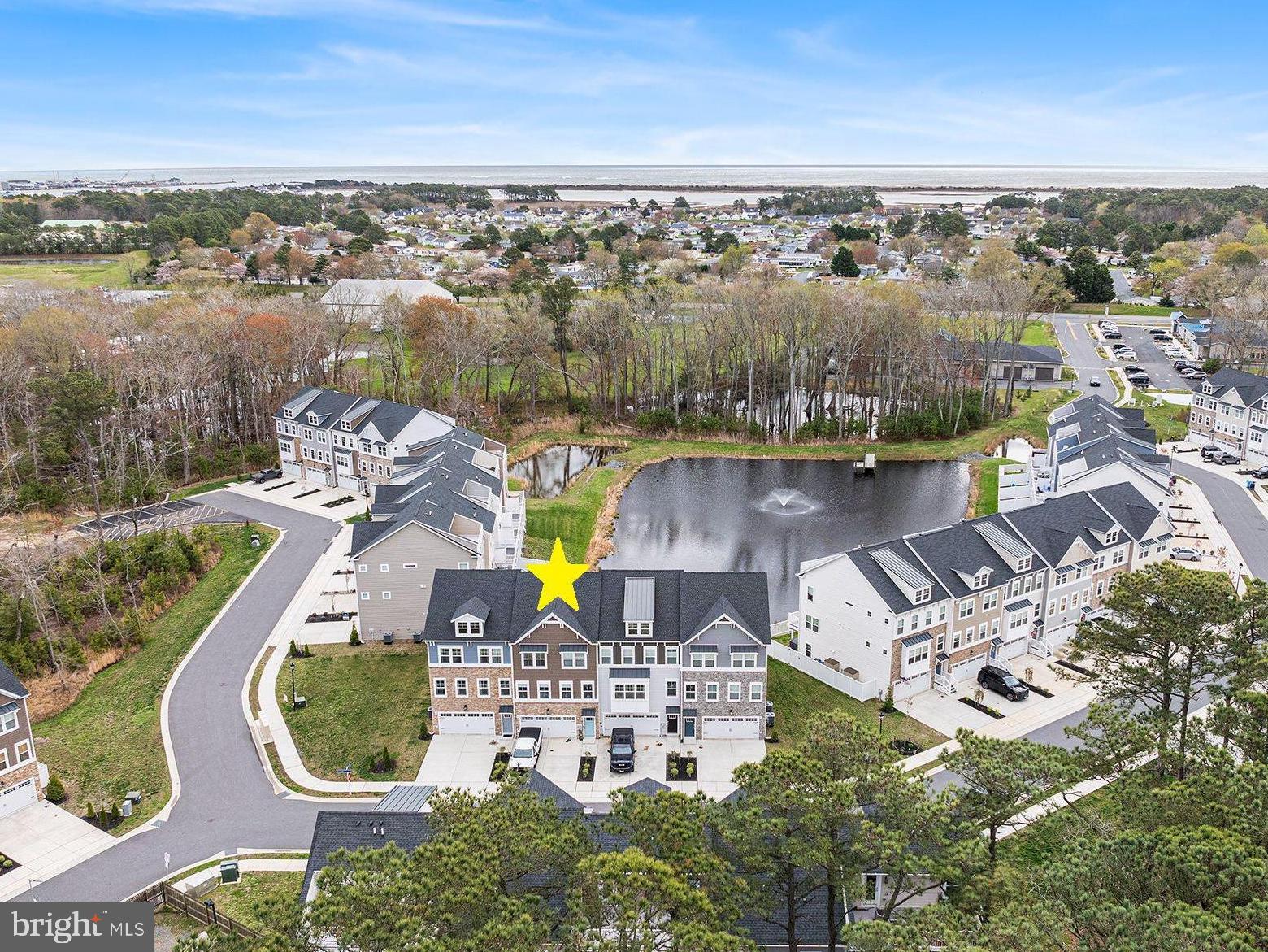 Welcome to Sea Oaks Village – Where Lifestyle Meets Location!
Nestled in the heart of West Ocean City, just 2 miles from the Ocean City Inlet, Sea Oaks Village is a vibrant lifestyle community where convenience and coastal charm come together. Whether you enjoy biking, scenic walks, or energizing runs, you're just minutes away from the beach, boardwalk, shops, and local dining.
This upgraded 3-story townhome offers an impressive 2,664 square feet of thoughtfully designed living space, featuring three bedrooms plus a versatile flex space, currently outfitted with a Murphy bed—perfect for accommodating guests during family visits or entertaining. The flex area includes an attached bathroom for added convenience and a full-length curtain that offers privacy when used as an additional sleeping space.
Step outside and unwind on two oversized rear decks overlooking a serene pond with a sparkling fountain—perfect for your morning coffee or evening gatherings with friends and family. One on the ground level and one off the main level.
Community perks include a brand-new pool opening soon, a playground, and a sports court with pickle ball and basketball courts. With parking for up to 4 vehicles, this makes entertaining and everyday living a breeze.
The main level boasts an open-concept layout with a chef’s dream kitchen centered around a massive island that comfortably seats up to 6, plus dining space for another 6-8. A walk-in pantry and powder room add functionality right off the kitchen.
Upstairs, the primary suite features a private bath, and the laundry area is thoughtfully placed just outside the bedrooms for maximum convenience. The additional 2 bedrooms are nearby and will share the full hall bath.
And here’s the best part—you get all of this without paying Ocean City taxes, giving you more freedom to enjoy the lifestyle you love.
Don’t miss your chance to make unforgettable memories this summer. Schedule your showing today at Sea Oaks Village!