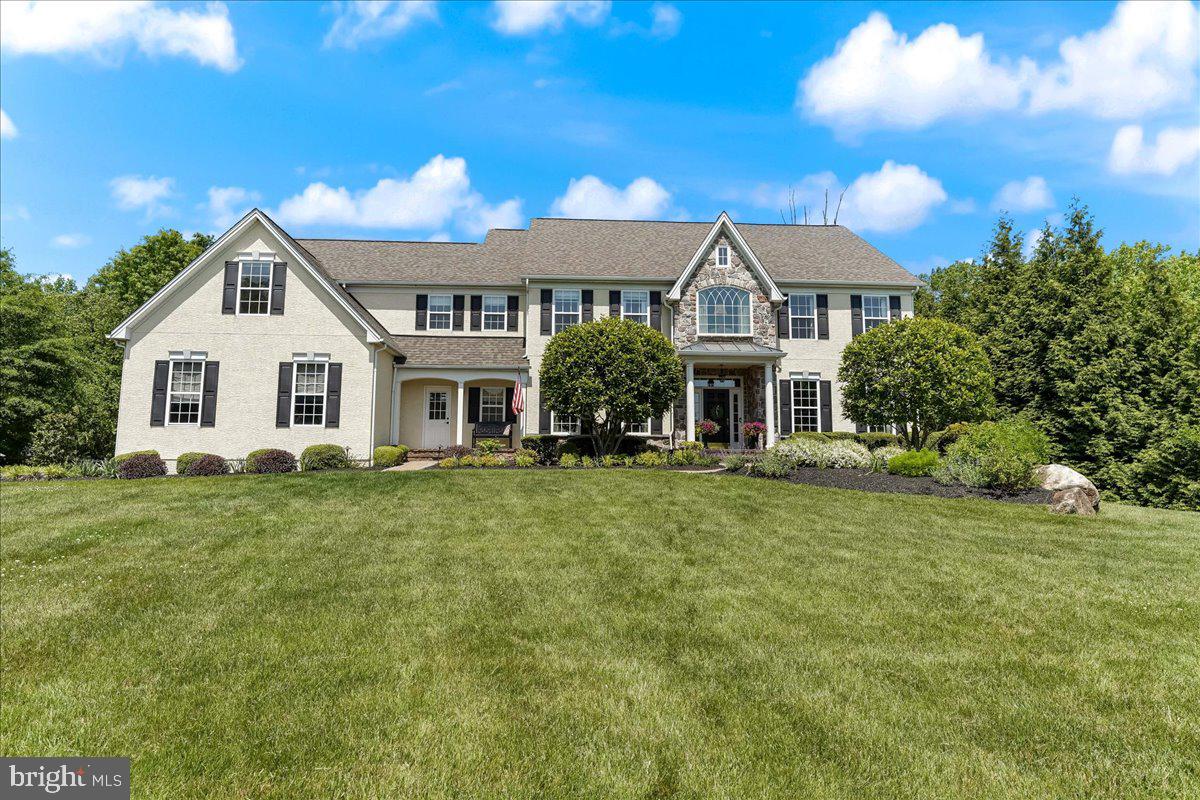 Welcome to this elegant and pristine home, situated in the highly sought-after community of Greystone. Inviting curb appeal and a welcoming entrance are just the beginning. As you enter, you will be greeted with hardwood floors, which flow throughout the main level, and an open light-filled interior. The gourmet kitchen features a large center island, granite counters, top-end cabinetry, double ovens, and breakfast room for casual dining. This thoughtfully designed kitchen provides abundant storage, offering both a walk-in pantry and butler’s pantry and custom amenities, including convenient additional Subzero fridge/freezer drawers. Adjoining the kitchen and breakfast room, the comfortable family room with natural gas fireplace features a wall of windows with custom plantation shutters, making this the perfect place to gather and entertain. The main floor study is handsomely decorated, with custom built-ins and beverage center. Enjoy views of the backyard from your own private oasis, the bright sunroom with E-Z Breeze windows on 3 sides. Stately formal living room and dining room with extensive molding and custom drapery, a bonus arts and crafts room, whimsical powder room and mud room complete the main floor. The second level offers an exquisite primary suite complemented with tray ceiling, sitting room, 2 extra-large custom walk-in closets, bright bath with double sinks, shower, tub and water closet. Three additional spacious bedrooms, one with en suite bathroom, a hall bath, a bonus dressing room and a conveniently located laundry room, as well as a cozy reading nook at the top of the stairs, complete this level. This gorgeous home boasts additional living space in the finished lower level offering an array of possibilities – game/rec room, theater room, workout area or an additional office space, as well as a sauna and full bath. Three car garage with Tesla charger. Landscape lighting, a sprinkler system and professional landscaping enhance the exterior. This stunning home offers the perfect blend of luxury and casual elegance. It has been meticulously maintained, and professionally decorated and curated. This is the one you don’t want to miss!