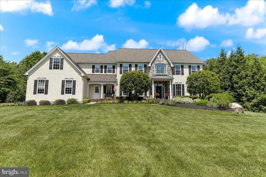 Welcome to this elegant and pristine home, situated in the highly sought-after community of Greystone.  Inviting curb appeal and a welcoming entrance are just the beginning.  As you enter, you will be greeted with hardwood floors, which flow throughout the main level, and an open light-filled interior.  The gourmet kitchen features a large center island, granite counters, top-end cabinetry, double ovens, and breakfast room for casual dining. This thoughtfully designed kitchen provides abundant storage, offering both a walk-in pantry and butler’s pantry and custom amenities, including convenient additional Subzero fridge/freezer drawers.  Adjoining the kitchen and breakfast room, the comfortable family room with natural gas fireplace features a wall of windows with custom plantation shutters, making this the perfect place to gather and entertain.  The main floor study is handsomely decorated, with custom built-ins and beverage center.  Enjoy views of the backyard from your own private oasis, the bright sunroom with E-Z Breeze windows on 3 sides. Stately formal living room and dining room with extensive molding and custom drapery, a bonus arts and crafts room, whimsical powder room and mud room complete the main floor. The second level offers an exquisite primary suite complemented with tray ceiling, sitting room, 2 extra-large custom walk-in closets, bright bath with double sinks, shower, tub and water closet. Three additional spacious bedrooms, one with en suite bathroom, a hall bath, a bonus dressing room and a conveniently located laundry room, as well as a cozy reading nook at the top of the stairs, complete this level. This gorgeous home boasts additional living space in the finished lower level offering an array of possibilities – game/rec room, theater room, workout area or an additional office space, as well as a sauna and full bath. Three car garage with Tesla charger.  Landscape lighting, a sprinkler system and professional landscaping enhance the exterior.  This stunning home offers the perfect blend of luxury and casual elegance.  It has been meticulously maintained, and professionally decorated and curated.  This is the one you don’t want to miss!