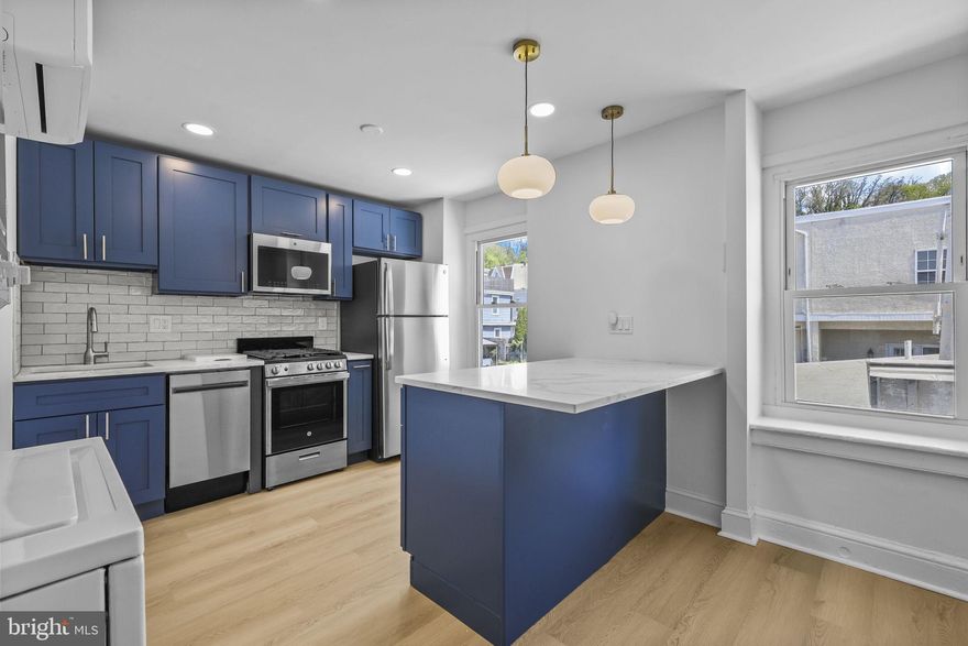 Modern Manayunk Living with RARE OFF-STREET PARKING!
Welcome to 3871 Terrace Street, Unit 3 – A Bright & Stylish Studio with Free Parking in the Heart of Manayunk. This beautifully renovated top-floor studio offers 500 SQFT of thoughtfully designed living space, combining modern finishes with everyday functionality — and the rare bonus of off-street parking included right next to the property. Features include: Fully renovated interior with modern appliances and finishes, open layout with rich hardwood floors, ceiling fan, and oversized windows for tons of natural light, stylish wooden divider separating the living area from the bedroom, spacious floor-to-ceiling closet system for optimal storage, design-forward kitchen featuring white quartz countertops, trendy blue cabinetry, statement lighting over an eat-in island, stainless steel appliances, and a window above the sink, sleek bathroom with subway tile tub/shower, blue vanity with white top, and a lighted mirror, in-unit washer and dryer for added convenience, mini split systems for efficient heating and cooling, additional storage space available in the basement, one dedicated parking space included with rent.
Lease Terms: First month, last month, and one-month security deposit required. Tenants cover electricity, gas, and cable/internet. A flat $40 monthly utility fee covers water, trash, and snow/ice removal.
Pet-friendly on a case-by-case basis with a $250 non-refundable pet fee and $25/month pet rent.
Located just a 10-minute walk to Main Street, you’ll have easy access to Manayunk’s vibrant shops, dining, and trails.
Don’t miss this rare opportunity to live in style with convenience in one of Philadelphia’s most sought-after neighborhoods. Schedule your tour today!