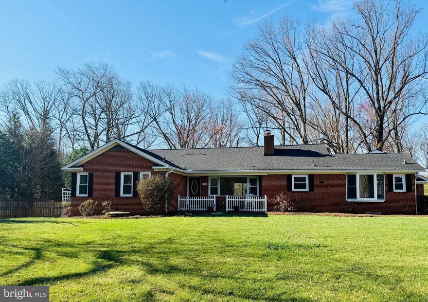 Rare opportunity to own a beautifully maintained home on a premium, flat one-acre lot in the highly sought-after Mantua-Pine Ridge community. With no HOA and access to the acclaimed Woodson High School pyramid, this exceptional property offers approximately 4,500 finished square feet, 5 bedrooms, and 4.5 baths, with generous spaces designed for both comfortable everyday living and effortless entertaining.

Thoughtfully updated throughout, the home features an updated kitchen and baths, along with a flexible layout that also accommodates one-level living if desired. A two-story primary suite addition, completed in 1995, provides an expansive and private retreat.  Sliding glass door from living areas and primary suite to an expansive deck. 

The lower level was extensively renovated in 2019 and includes a new full bath, luxury vinyl plank flooring, and recessed lighting. This level also offers a kitchenette, bar, fifth bedroom, laundry room, and abundant storage. The fifth bedroom serves as an ideal in-law or au pair suite, while the added lower-level space—part of the addition—offers versatility as an artist’s studio, exercise room, or home office.

Major system updates include a roof and oversized gutters replaced in 2020, along with a boiler and hot water heater installed in 2016.  

Set in one of Fairfax County’s most desirable neighborhoods, the home offers an outstanding lifestyle with nearby parks, scenic walking paths, and easy access to the Cross County Trail. The Mantua Swim & Tennis Club is close by, with opportunities to join the waitlist or rent a membership when available. Residents also enjoy a strong sense of community, with events and activities hosted by the Pine Ridge association and Mantua Swim and Tennis Club.

Perfectly positioned for convenience, the property is just minutes from the Mosaic District, Pickett Shopping Center, Trader Joe’s, and Inova Fairfax Hospital. Commuters will appreciate easy access to I-495, Route 50, Route 29, I-395, and I-66, along with nearby Vienna and Dunn Loring Metro stations. Tysons Corner is only a short drive away.

A rare offering in an exceptional location, this home combines space, updates, and versatility in a neighborhood that is truly special.  Woodson High School. Open Sunday March 29, 2-4 pm