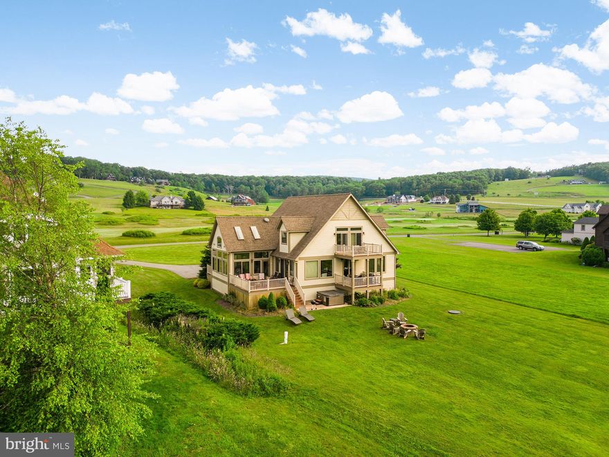 Stunning lakefront retreat featuring five en suites, expansive lake views, and an inviting pool room, perfect for relaxing or entertaining. The pool room has been recently upgraded to include a new dehumidifier and heater, enhancing comfort and usability year-round. This property, "Waterfront Links", also boasts a strong rental history with impressive income, making it an excellent investment opportunity or personal getaway. Located in the beautiful Waterfront Greens community, which offers many amenities including a par-3 9-hole golf course, mini golf, catch-n-release pond, and a tennis court. If all of this isn't enough, you also have a single dock slip to enjoy the waters of Deep Creek Lake. Nearby to restaurants, grocery stores, activities, DCL State Park, and Wisp Resort.