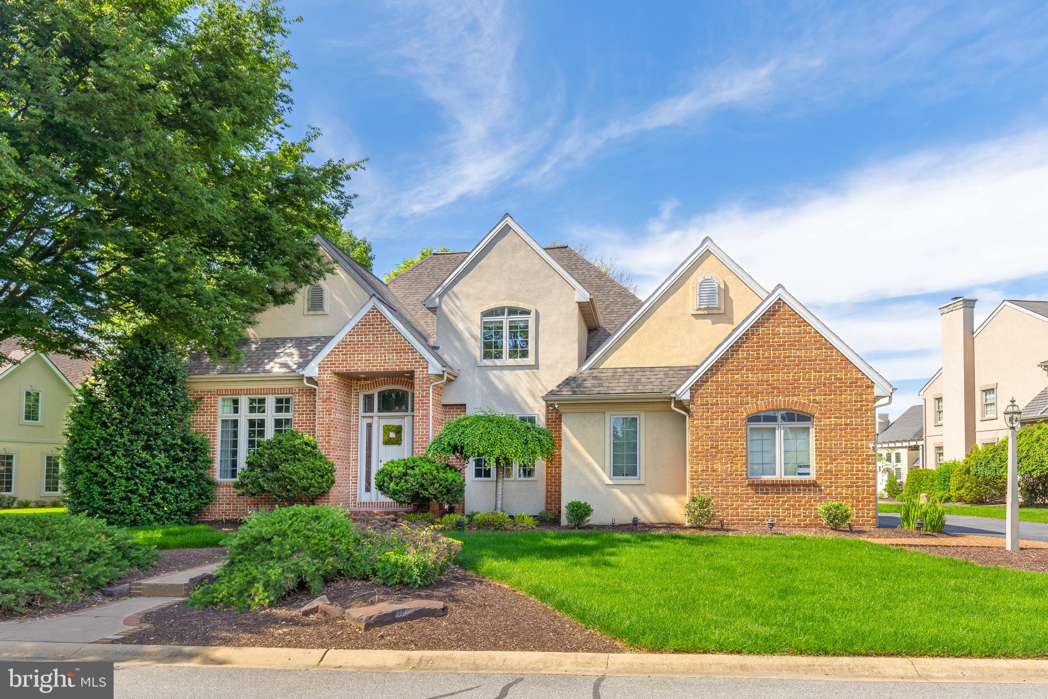 This gorgeous, custom brick home sits on the 16th tee box within the gated Bent Creek Country Club community. This property is in Manheim Township School District and just minutes away from everything Lititz has to offer- shopping, dining, entertainment, and much more! With nearly 5500 sq. ft. of space this home offers endless opportunities. The main floor has over 2000 sq. ft. of common space with high ceilings, large custom windows, multiple fireplaces and views of the golf course. Upstairs you’ll find an enormous owners suite with beautiful cork floors. In the basement you’ll discover incredible bonus space with a den, third fireplace, large bar and full bathroom. Both the main floor and basement include plenty of space to add a 4th / 5th bedroom. The backyard offers a massive private patio and back deck with grill, refrigerator, fire pit, tranquil fish bond and a large flat yard. This home has been meticulously cared for with a newer roof, HVAC and more. Move right in and don’t worry about a thing. Bent Creek offers tons of amenities including golf, tennis, pickleball, dining and swimming. Don’t miss this opportunity. Reach out today to schedule a private showing!