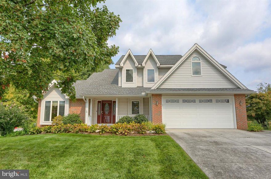Gorgeous, move-in ready home on corner lot in Green Lane Manor!  The first floor's open floor plan easily lends itself to endless entertaining possibilities and plenty of room for family and friends.  A two story foyer with split staircase leads into the living room with its vaulted ceiling and floor to ceiling windows.  Walking through the dining room you will arrive at a gourmet kitchen that is a chef's dream!  With endless custom cabinets, crown molding, a built-in pantry, oversized granite countertops, soft close drawers and a double oven, the kitchen is the centerpiece of this home.  The family room features a raised brick gas fireplace flanked by built-in shelving.  Powder room with granite countertop and laundry room with utility sink complete the main floor.  Upstairs you will find four spacious bedrooms, each with a ceiling fan.  The primary bedroom and ensuite bath will not disappoint!  A walk-in closet, soaking tub, double sinks and separate stall shower allow for privacy and convenience.  Three additional bedrooms and a full hall bath with tub shower provide ample space for everyone.  This home's exterior lives up to the beauty of the interior.  An oversized deck leads down onto a wonderful patio and a garden filled with tomatoes, coneflowers and marigolds.  The privacy of this corner lot in a fantastic pedestrian neighborhood is a rare find in the area.  This is the home you have been looking for, do not hesitate to schedule a private showing today!