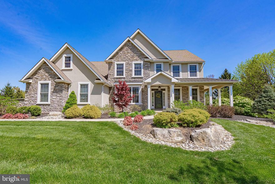 This exquisite Custom home combines elegant design w/modern amenities*Nestled in the peaceful area of Stone Briar, Lower Nazareth*Meticulously landscaped yard w/stunning stone facade exceeds timeless appeals*This beautifully designed home seamlessly blends sophistication w/comfort*Spacious foyer sets the tone for the elegance that flows effortlessly from rm to rm highlighted by rich wood fls and tasteful finishes like tray lighted 9' ceilings+ crown moldings*French doors lead to the study w/built in book cases and 1 of 4 fireplaces*As you enter the heart of the home, expansive kitchen features Quartz counters, farm sink, Monogram appliances, smart fridge, lg island, custom walk-in pantry w/pull out drawers*Great Rm has an abundance of natural light and gas fireplace*Powder rm, Mud rm/Laundry rm *2nd level features 3 oversized bedrooms*Jack and jill bathroom*Bedroom w/private ensuite bathroom*A Master retreat w/ tray lighted ceiling, gas fireplace+ sitting area*Master bath w/heated floors, dual shower head*Lg custom walk-in closet with organizers*Add'l rm(closet/office/yoga)*Finished basement features a movie theatre, play room, family room w/ large windows, fireplace for those cozy winter nights*Built in Bar area w/stone and custom cabinetry*4th full bathroom, w/o entrance to driveway*Plus State of The Art ELAN home Automation System*Lutron motorized shades and integrated audio throughout!3 car garage*1 acre lot* Minutes to Rts 22, 33 and St Lukes Anderson Campus.