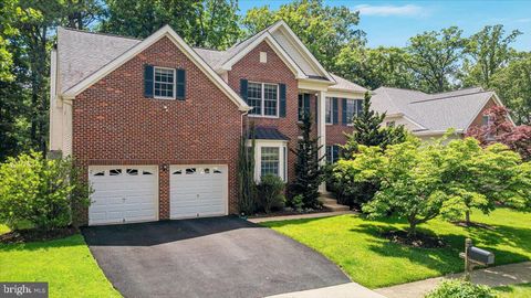 Photo of 12221 Harbor Town Circle, FAIRFAX, VA 22033 (MLS # VAFX2314878)