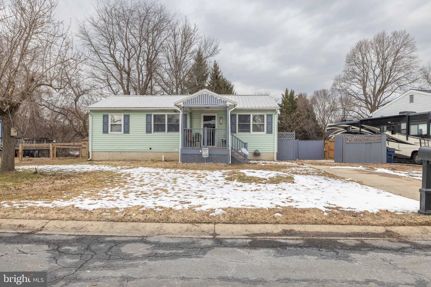 Showings to start at 1pm on Sunday, March 1st! Welcome to this spacious 2-bedroom, 3-bath home located in the desirable Meadowview neighborhood! Offering flexible living space and incredible potential, this property is perfect for Buyers seeking room to grow, entertain, or accommodate extended family. The main level features a bright and inviting layout, highlighted by a beautifully updated kitchen with brand new stainless steel appliances, a touch-less sink faucet and a pantry, providing both style and functionality. Just off the rear of the home, you’ll find a relaxing sun porch — the perfect spot to enjoy your morning coffee or unwind in the evening. The generous primary suite offers a true retreat, complete with a large private bathroom featuring a jetted tub and convenient stacked laundry, creating the ultimate functional owner’s space. The suite also includes a spacious walk-in closet along with additional built-in drawer storage for optimal organization. The second full bathroom on the main level has been thoughtfully handicap-modified and includes a walk-in shower and double sink vanity, offering both accessibility and convenience. Downstairs, the fully finished basement expands your living options with a complete in-law suite setup, including its own kitchen and full bathroom — ideal for multigenerational living, guests, or potential rental opportunities. Step outside to a fully fenced backyard offering privacy and space to spread out. A large deck provides excellent entertaining potential (in need of repair), while the huge workshop and additional shed in the rear yard make this property a dream for hobbyists, contractors, or anyone in need of serious storage and workspace. With three full bathrooms, versatile living areas, and valuable outdoor features, this Meadowview gem offers both comfort and opportunity. The Seller has installed a new HVAC system, and a mini-split system servicing the basement and bedroom #2 area. Mini-split system is negotiable with an acceptable offer. Schedule your tour today and imagine the possibilities! Home is being sold "as is".