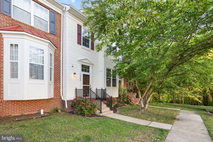 This stunning 3-level townhome offers exceptional upgrades throughout and is one of the largest models in the highly sought-after Sheffield Manor community. Boasting over $100,000 in upgrades, this home features bump-outs on every level along with the builder’s optional bay window, maximizing space and functionality at every turn. If there was an option to expand, this home has it.

The interior is filled with natural light, creating a bright and welcoming atmosphere throughout. The heart of the home is the beautifully designed custom kitchen, showcasing high-end finishes and thoughtful design, perfect for both everyday living and entertaining. Right-off the kitchen you will also enjoy a large deck overlooking a tree-line (not another row of townhomes!) that is perfect for added privacy. Upstairs, you’ll find three spacious bedrooms, including a luxurious primary suite highlighted by a fully customized bathroom with an upgraded layout and cabinetry that truly elevates the space.

The finished basement adds even more versatility with a BONUS ROOM ideal for a home office, gym, guest space, or additional living area.

Sheffield Manor offers an amenity-rich lifestyle with a community clubhouse, Olympic-size pool, four playgrounds, tennis and pickleball courts, basketball courts, walking trails, and more. Conveniently located near Routes 28 and 29, I-66, and Prince William Parkway, this home provides seamless commuter access while keeping you close to local favorites like 2 Silos Brewery, Jiffy Lube Live, and the shopping and dining options throughout Western Prince William County.

Zoned for Chris Yung Elementary, Gainesville Middle, and Gainesville High School.