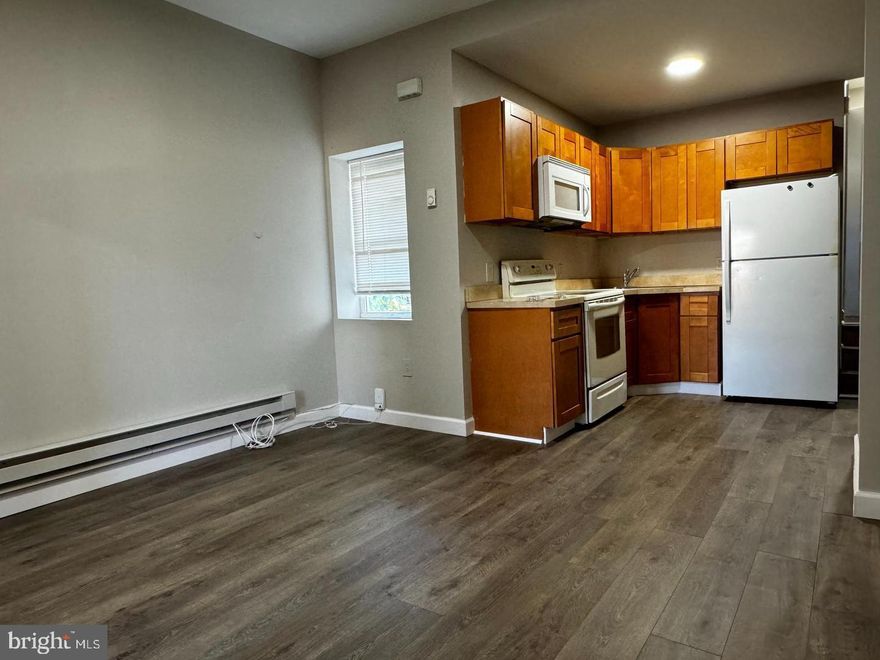 Welcome home to this charming 2 bed, 1 bath apartment with in unit laundry! **1st, last, security due upon acceptance along with a $167 trash fee (yearly)** Water is divided between all 3 units.