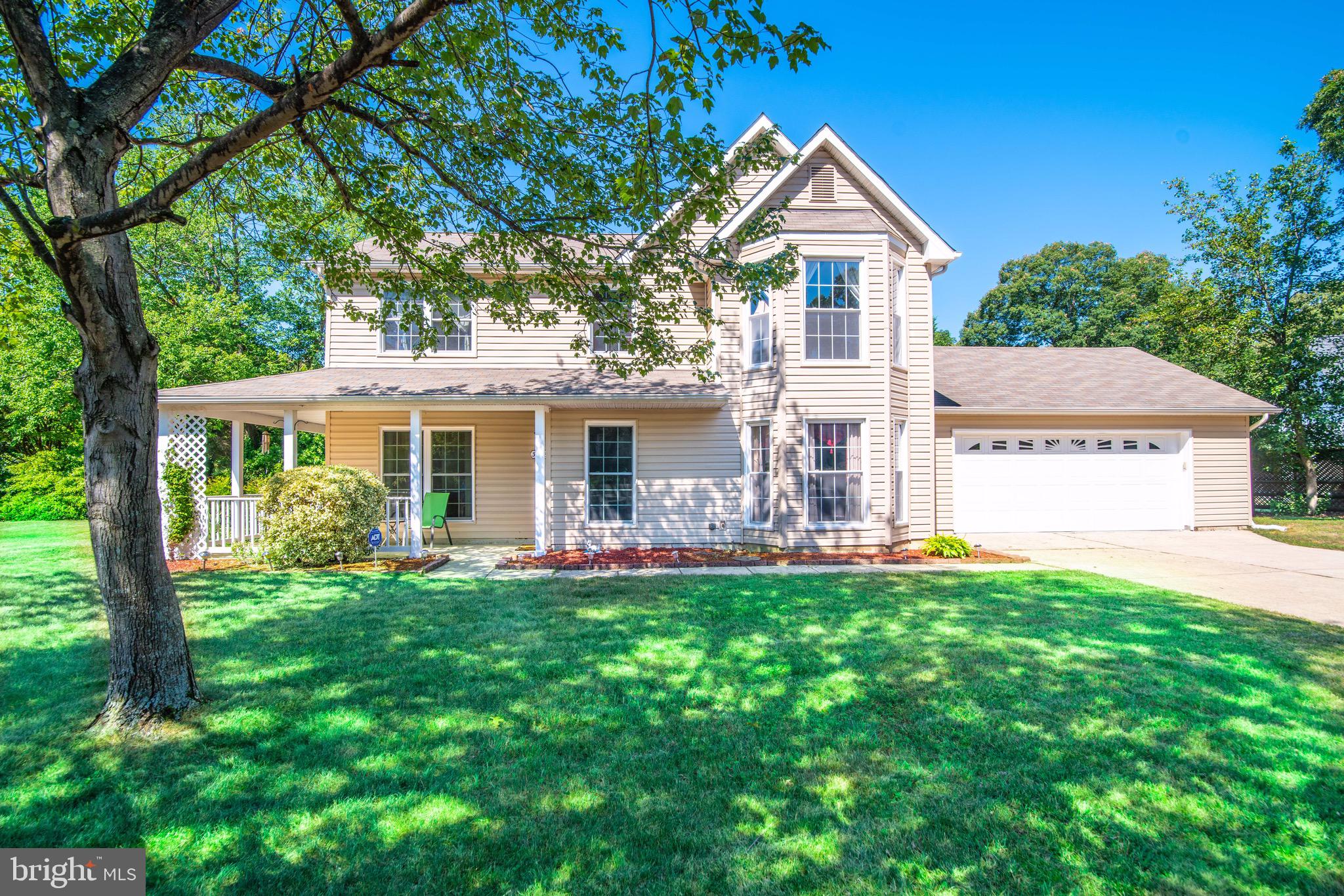 Beautiful 4 bedroom, 2.5 bath Colonial situated on a large corner lot with fully fenced backyard and large wrap-around front porch. Newly renovated kitchen with new cabinets, granite countertops, backsplash, peninsula, pantry and stainless steel appliances. Expansive living area on the main level offering a living room, dining room, eat-in kitchen and family room. The upper level features a primary bedroom with vaulted ceiling, bay window, walk-in closet, and ensuite bath with new vanity. Three additional bedrooms, a hall bathroom and laundry closet complete the upper level. The large corner lot offers a privacy fenced backyard with concrete patio, shed and space to grill and play! Oversized garage with space for cars, storage, a workshop and door to backyard. Newer roof, siding and gutters! Move-in and immediately start enjoying your new home! Community amenities include pool, playground and tennis courts. Close proximity to Rt 5 for access to all commuter routes.