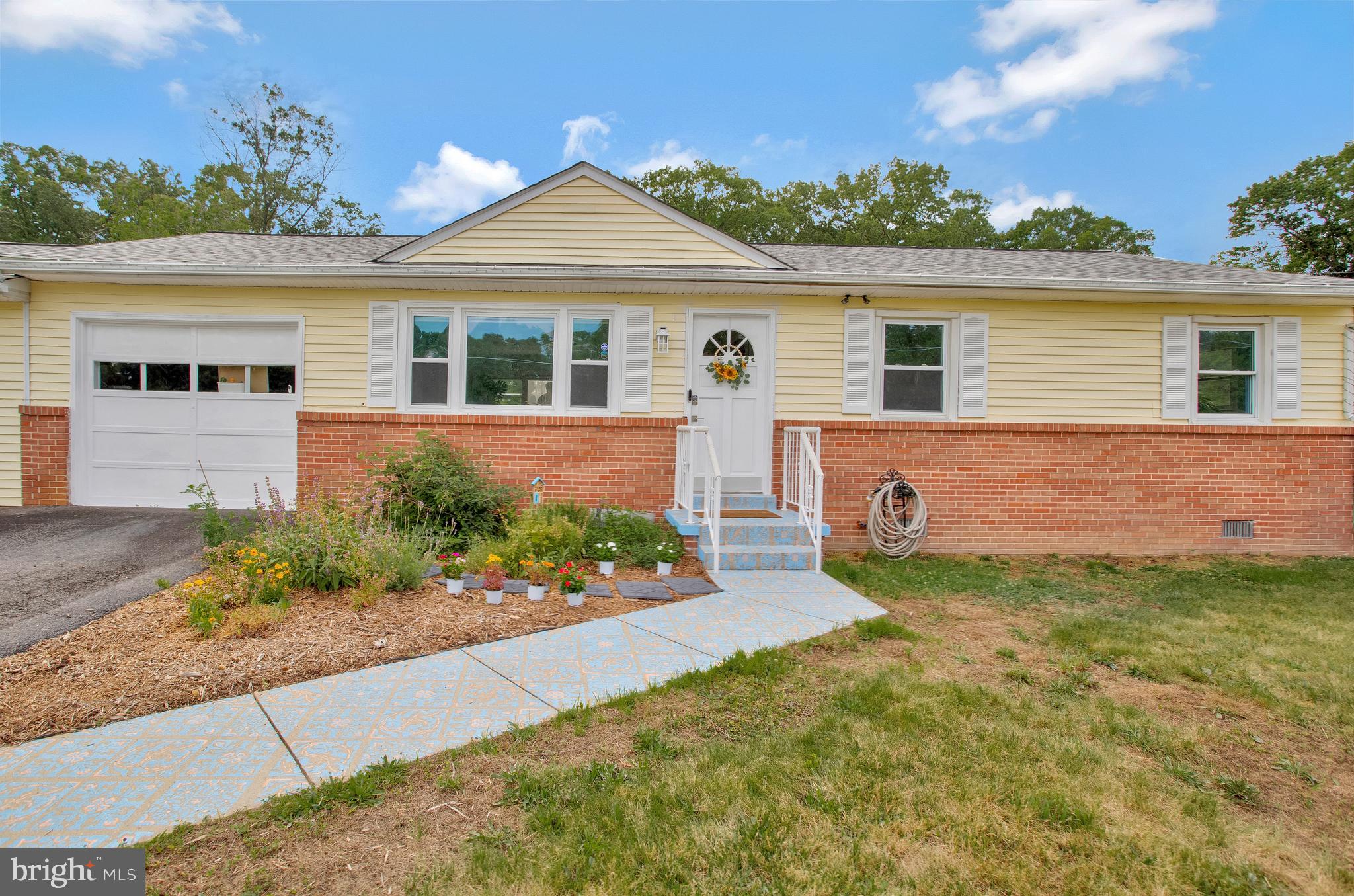 OPEN HOUSE SUNDAY, JULY 30th 12-2pm. NEW ROOF! Experience city life with a country feel in this updated 3-bed, 1.5-bath rambler home. This homes will provide years of low maintenance living with ll the recent upgrades! Featuring hardwood floors, granite countertops, updated bathrooms, new lighting fixtures, large rec room with a pantry and an an updated laundry room, this home is ready for you. Large living room with lots of natural light. The appliances include newer A/C and heating unit, new washer and dryer. Located on an acre, enjoy the back deck with built-in seating and expansive fenced yard with an established garden. Attached garage with oversized driveway and an outside garage/storage area. NO HOA! Convenient location off US HWY 301. Book now, won't last!