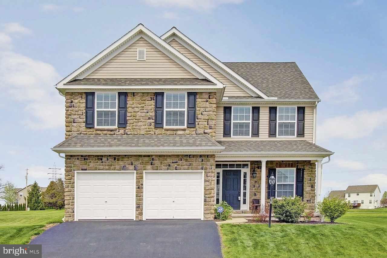 Extraordinary Remarkable amenities Over 3300 SF w/open flr plan Lg kit FR w/stone gas FP Stunning sunrm Spacious BRS Gorgeous master suite w/master bath/whirlpool tub/w-in closet Finished LL features FR Rec rm Add't BR+full bath Manicured yard features Trex deck/flagstone patio Conveniently located to schools/Rt 30/shopping Don't miss opportunity to see this home