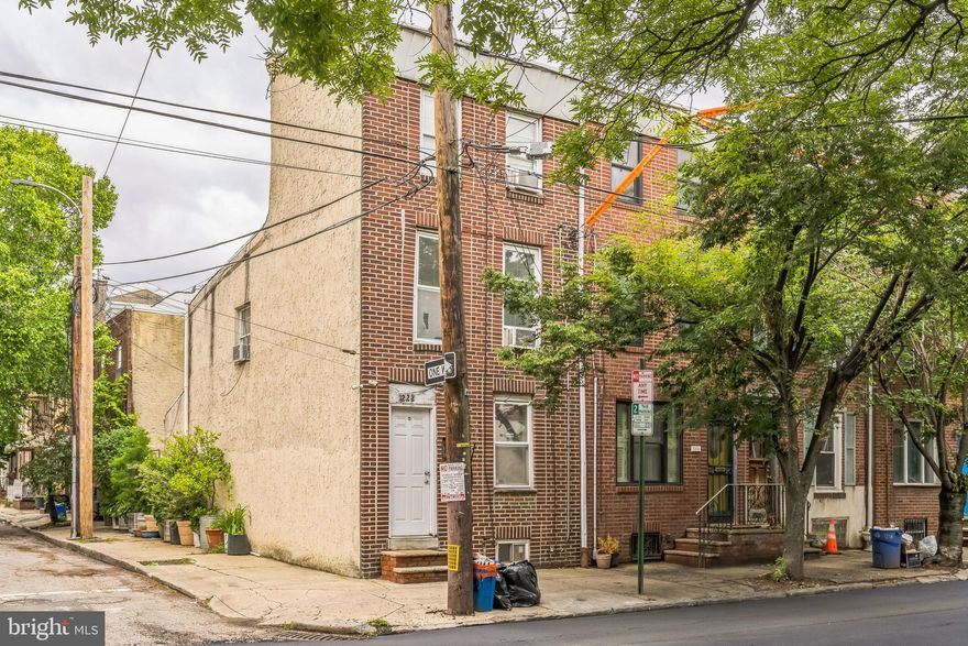 This charming 3-story end-unit townhouse in South Philadelphia offers great potential with 3 bedrooms, 1 bathroom, and the added benefit of extra natural light from its corner location. The property features the classic character and solid bones typical of Philadelphia rowhomes, with multiple levels providing excellent separation between living and sleeping spaces. While the home does require some updating and TLC throughout, it presents an excellent opportunity for buyers looking to customize and add value through renovation. The desirable South Philly location provides easy access to local amenities, dining, and transportation, making this an ideal investment for those ready to bring this property back to its full potential.