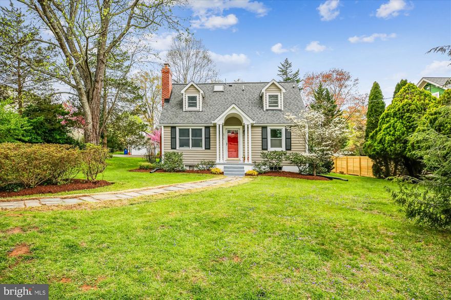 Welcome to this enchanting, expanded, freshly painted Cape Cod in the desirable Cabin John Park neighborhood, set on an incredible 17,000-square-foot lot. Originally built in 1938, a major addition by renowned architect Thomas Manion beautifully combines classic charm with modern living spaces. This home is highlighted by exquisite finishes, skylights, beamed ceilings, two cast iron wood-burning stoves, high ceilings, gleaming wood floors, and superb architectural details throughout.
 
The main floor features an inviting living room with recessed lighting and a fireplace with a cast iron insert. The heart of the home lies in its open-concept floor plan, seamlessly integrating cooking, entertainment, and relaxation zones. The updated kitchen opens to both the dining room and family room, offering granite counters, a stainless steel appliance suite, a Thermador gas range with a stainless steel hood, Mouser custom wood cabinetry with soft-close drawers, and two built-in China cabinets. The sun-drenched dining/family room has vaulted and beamed ceilings, with access to a rear deck under a pergola that provides shade for outdoor dining and relaxation.  The spacious family room boasts a stone accent wall with a cast iron stove and portal windows.  Two bright bedrooms and updated full bathroom complete the main level.
 
The newly carpeted second level features two en-suite bedrooms with attached bathrooms.  A generous, light-filled primary suite features two walk-in closets and a primary bathroom featuring a double vanity and jetted soaking tub. The lower level is unfinished, offering a laundry area and two large storage rooms.
 
The quiet and picturesque grounds of this home are truly captivating, featuring a wildlife-friendly grass lawn, mature trees, native and ornamental plantings, and a large annual/vegetable garden.  The southwest orientation of the house is ideal for capturing late afternoon light and beautiful winter sunsets.  The back deck offers a tranquil place to eat, sit, and enjoy the abundant backyard wildlife.  A long, gravel driveway leads to a detached garage.

This home offers a tranquil escape for nature lovers and easy access to the C&O Canal.  Walk or bike along the canal towpath or take a hike on the nearby Cabin John Trail just steps away.   

Ideally located near the local shopping center, the Bethesda coop, community swim club, post office, top rated schools, shopping, restaurants, Potomac town center and the vibrant offerings of downtown Bethesda.