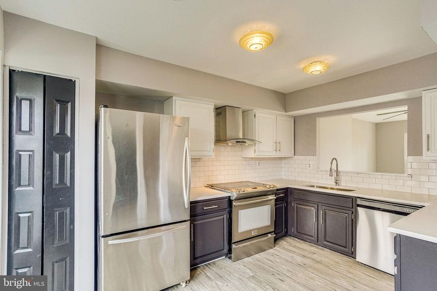 Priced To Sell Fast! Desirable 3 Level Townhouse, Updated Kitchen with QUARTZ Counters, Stainless Steel Appliances, Modern Tile Backsplash, Spacious Bedrooms, New Custom Paint, New Flooring, New Lighting, Updates in Bathrooms, Fireplace, Much More!  Close to Schools, Shopping, Commuter Routes, and Much More! This Will Not Last!