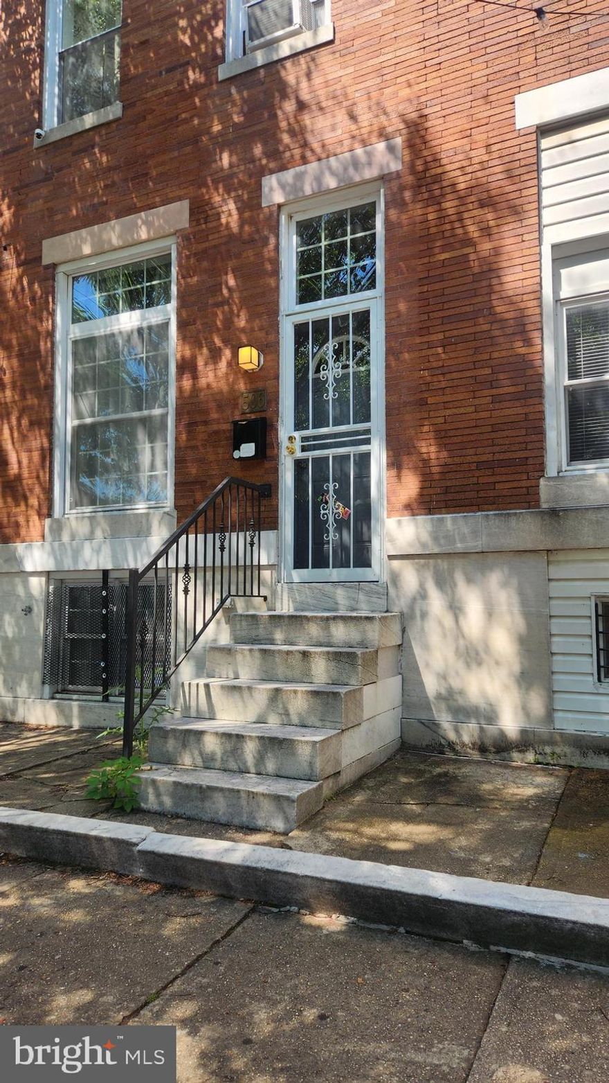 Back on Market buyers loss your Gain , dont miss this Beautifully renovated home with exposed brick wall adding warmth and character to this charming townhouse.  Original hardwood floors with open floor concept and large kitchen great for entertaining. Upper level features two bedrooms and a den or office space. The basememt is finished with a family room or can be used as third bedroom and has a finished bath. There is also a large storage room and fenced in yard. Property is being sold as is. If your client likes any furniture pieces please make an offer.