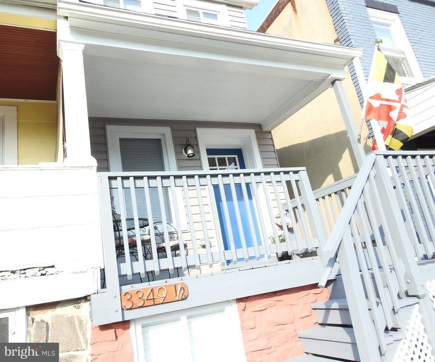 Beautifully rehabbed with attention to every detail. Freshly painted throughout, gleaming hardwood floors, recessed lights, new kitchen includes new backsplash, SS appliances, granite countertops with convenient rear entry from #2 car rear parking pad. Two new ceramic bath rooms, lower level fam. rm. w/ laundry and storage. Amazing roof top deck w/ city views. Park in rear when showing.