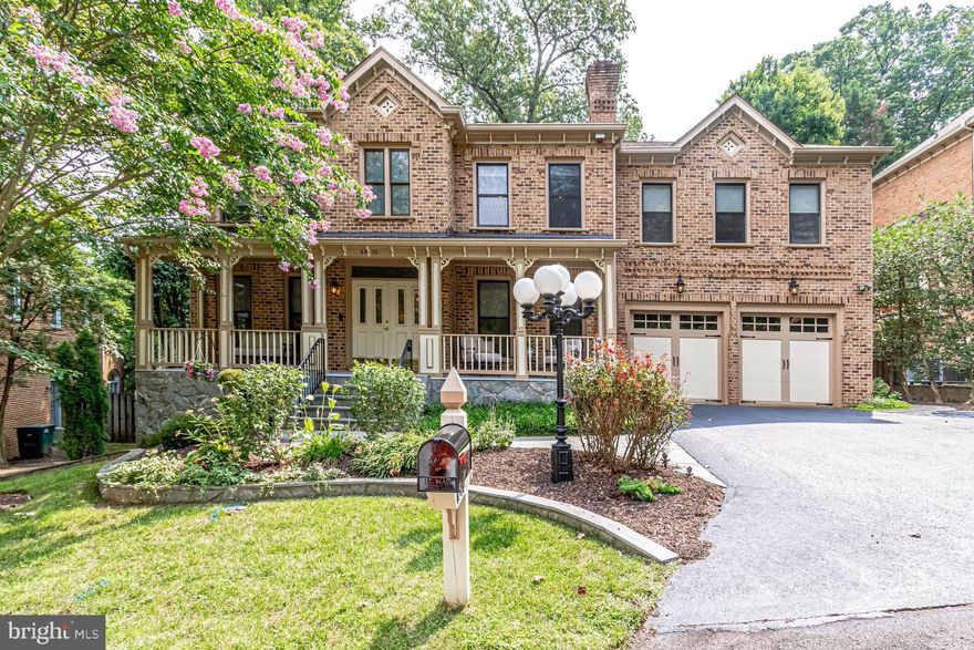 This  beautiful five bedroom, four and one half bath  brick colonial  boasts 4700SF+  total living space and is situated across from beautiful parklands and greenery.  Sit on the expansive front porch and enjoy the serene setting and watch the wildlife walk by.   This home is perfect for entertaining, working from home and/or online schooling.  Bathrooms and the kitchen have been renovated and updated.   Chair rails, moldings, and custom built ins are featured throughout the home.   Brand new carpet on the entire upper bedroom floor  was just installed.  Hardwood floors have been newly refinished  The  recreation room opens to the slate patio and has a gym, sauna, and plenty of space for entertaining, and an in-law/au pair suite.  The deck is perfect for dining al fresco or doing your morning yoga.  Close to everything- DC, Great Falls, parks and trails. Minutes to grocery stores, schools, dining and shopping.