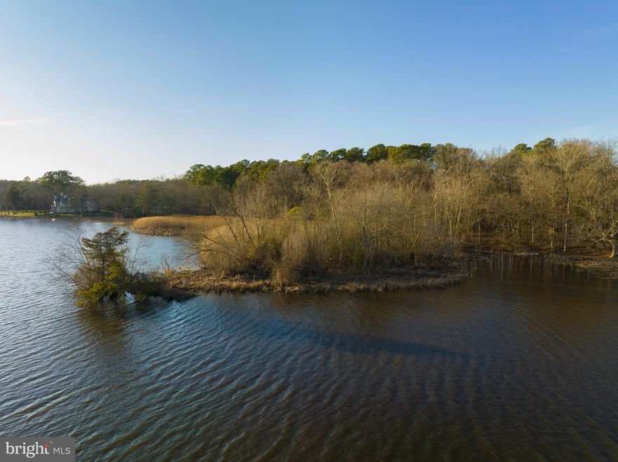 Come with your house plans and build your waterfront dream home!! This 3.54 acre waterfront building lot is a rare find! To make things better, you have the opportunity to also purchase the neighboring lot and create  your very own 10 acre waterfront oasis. This property is tucked in the back of the Harbor Pointe Subdivision which is known for having some of Salisbury's highest end homes.  Enjoy living on the water with the convenience of also being close to town, shopping, restaurants and health care. There is a survey on file, and there is city water and sewer tie-in available.