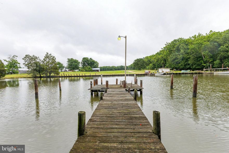 This charming Cape Cod-style waterfront home offers endless potential with stunning views and direct access to the water. Featuring 3 spacious bedrooms and 3 full bathrooms, this property is perfect for those looking to make their own mark with a little TLC. With its private pier and boat ramp, this home is an outdoor enthusiast’s dream including a three-car detached garage. Whether you’re into fishing, boating, or simply relaxing by the water, this location is ideal for waterfront living. Quiet, serene location away from the hustle and bustle, yet close enough to local amenities. Incredible investment opportunity with room for improvement and value appreciation. Whether you’re looking for a vacation getaway or a full-time residence, this property offers a rare opportunity to live the waterfront lifestyle at an incredible price. Don’t miss your chance to own a piece of paradise – with just a little TLC, this home could be your perfect oasis!!