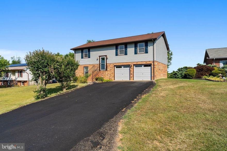 Nestled in Spotsylvania, VA, this impeccably maintained split-level home boasts 3 bedrooms and 2.5 baths. Upon entry on the main level, a kitchen welcomes you with updated appliances including a refrigerator, stove, dishwasher, and double sink. The adjacent dining room and living area flow seamlessly to a serene back deck, perfect for outdoor entertaining.

The primary bedroom features an ensuite bath with a shower and tub combo, offering a private retreat. Two additional bedrooms and another full bath complete the inviting main level. Downstairs, a spacious rec room awaits, accompanied by a convenient half bath and a dedicated laundry area.

Enhancing the home's appeal, a generously sized front-loading garage provides ample storage space. Outside, a patio beneath the deck and raised garden beds await in the backyard.

This home, lovingly cared for by its sole owner, embodies comfort and quality, ready to welcome its new owners.

Located roughly 15 minutes to 95. Close to a commuter lot, shopping, downtown Fredericksburg, or the main parks and rural areas of the county.