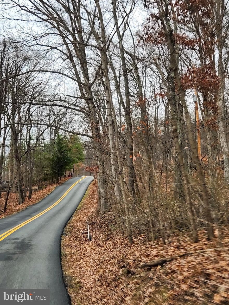 Perfect spot to build your country home dream house! 30 acres are divided into three equal lots. Each lot is perc tested and class 1 approved. Price per lot is $125,000 each. Each lot has a separate driveway onto Nancy Jack road. Lots are on a gently sloping mountain side within 15 minutes of both Martinsburg and Inwood, WV. Public water is available through Berkeley County Public Water district.