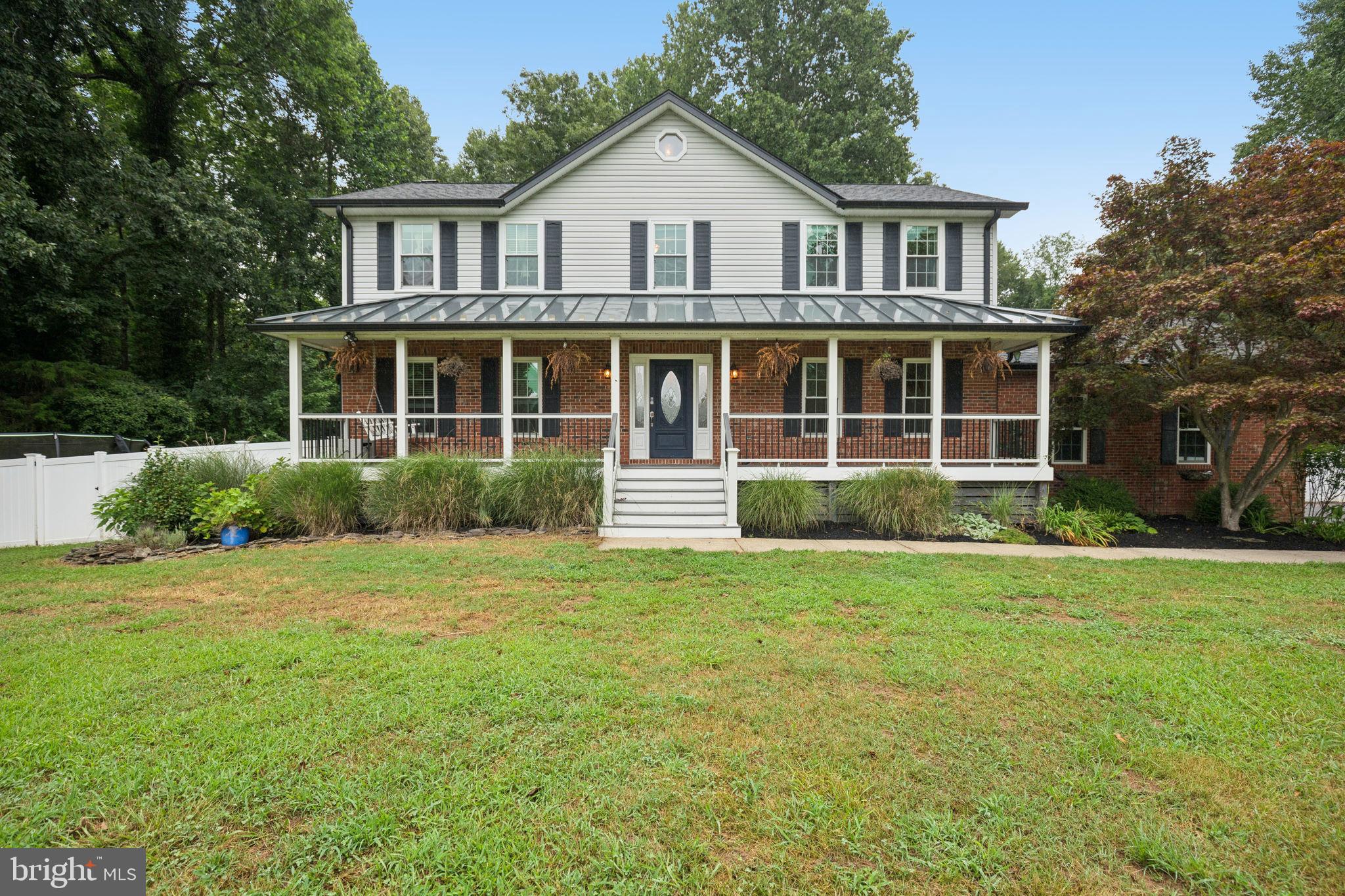 Fantastic home on 4.25 Acres!!! This house is an extremely rare home with 3 finished levels with a complete in law apartment in basement with full kitchen, bedroom, family room and full bathroom!! The upper 2 levels are awesome with hardwood floors, with dining room, huge family room and spectacular kitchen complete with granite counters, stainless steel appliances, range hood and high end cabinets. The main level also boasts a screened in porch with deck area overlooking fenced in backyard. The upper level has 4 bedrooms with 2 full bathrooms. Owners suite is huge with custom closet cabinets and full bathroom with luxury shower, soaker tub and separate vanity area with plenty of cabinets. This house has a private lot with no hoa. There is a pond on the property and plenty of trails and places to explore.