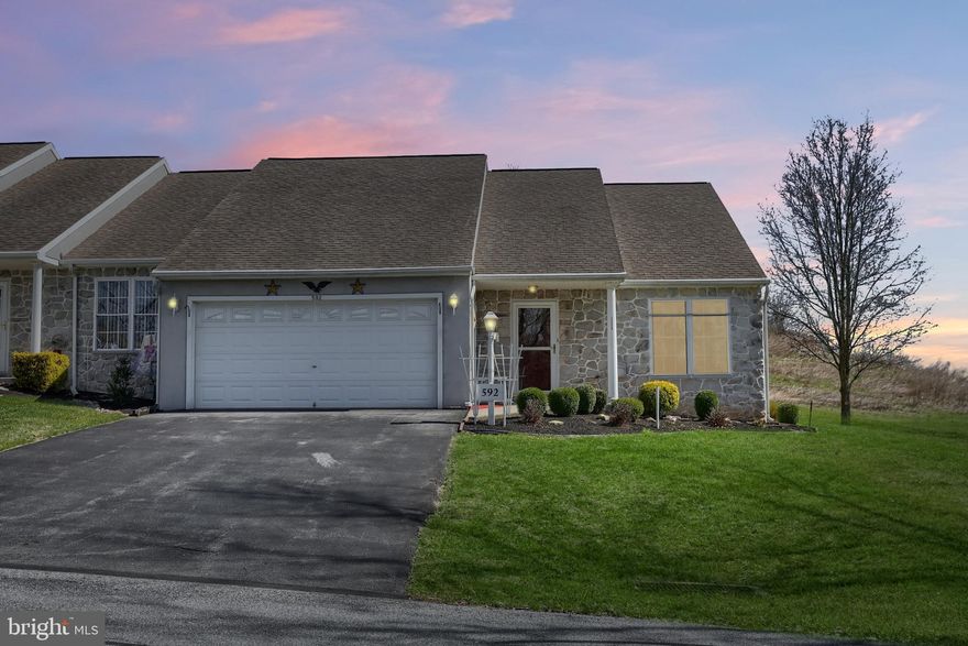 Embrace a simplified lifestyle at The Aspens 55+ Community.  Say goodbye to lawn cutting, snow removal, trash, water, and sewer bills!  It's taken care of for you ($140.00 per month)! Built in 2004, this ranch-style end unit features a welcoming layout with two spacious bedrooms and one and a half bathrooms, ideal for easy living. Step inside to discover a warm atmosphere with functional one-level living. The main living area is highlighted by the cathedral ceiling and fresh paint.  Sunny dining area with 2 windows.  The kitchen has plenty of counter space, cabinetry,  gas cooking, a center island with seating for two. The primary suite boasts room for a king-sized bed, a very spacious walk-in closet, and a large private bath with a stall shower, double sink, and an oversized linen closet.  The secondary bedroom measures 13 x 14.   Enjoy the outdoors from the 11 x 14  screened porch, perfect for sipping coffee while enjoying a good book.  Bring all your favorite plants here and watch them thrive in the warm months of the year. With an attached garage 19 x 24, and ample off-street parking, convenience is at your fingertips. The garage has cabinetry, is heated, has a refrigerator, utility sink, and storage closet with shelving. NOTEABLE FEATURES:  some fresh paint (2026), gas hot water heater (2023), gas furnace (2018), central air handler (2018).  THE ASPENS 55+ Community takes care of the following:  lawn cutting, snow removal, trash services, water, and sewer for the current monthly fee of $140.  Experience the tranquility of this home, bring your touches, and make it yours. Say yes to a more simplified lifestyle today! Become a homeowner in The Aspens!