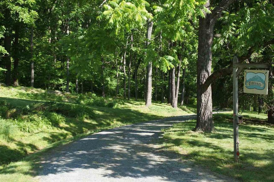 Located in Western Albemarle at the foot of the Blue Ridge Mountains and near beautiful orchards, this idyllic and privately situated 2.14 acre wooded lot is the perfect place for your custom home or long term investment.  The soils work has been complete for a four bedroom home.  Call your Realtor today for plats and information.  Shown by appointment only.,BREITENAU