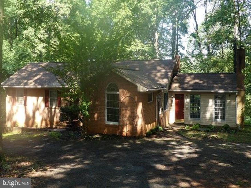 Affordable Horse Farm This is what you have been looking for! Dogwood Springs offers a large brick ranch house, full walk-out basement, inground pool, and a horse barn on 5.11+/- acres all for the affordable price of $337,000. This large ranch home w/ features large wooden decks overlooking the barn and pastures.  So much living space for the family with a large great room w/ fireplace, music/library room, large eat-in kitchen, oversized bedrooms, wood floors, finished basement with full bath and so much more for you and your family.  Gated Drive & Peaceful setting just minutes from town. Sold "AS IS"