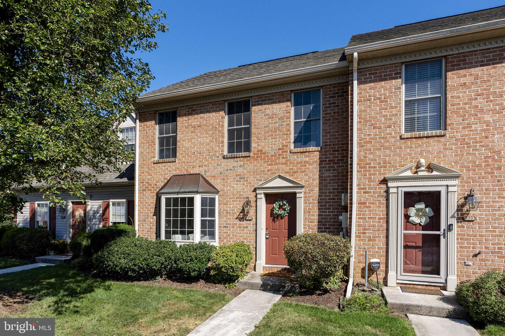 Welcome to 325 Stonehedge Lane, a beautifully updated townhome in the heart of Mechanicsburg. Step inside to find a bright and inviting living room highlighted by a large bay window, fresh neutral paint, and stylish new flooring that flows throughout the main level. The cozy fireplace provides the perfect focal point for relaxing evenings, while the open layout seamlessly connects the living and dining areas. The kitchen offers ample cabinetry and countertop space with a convenient breakfast bar, making it ideal for everyday living and entertaining. Upstairs, you’ll find well-sized bedrooms with generous closet space, along with a full bath designed for comfort and convenience. Outside, the classic brick front and tidy landscaping add to the home’s curb appeal, and the private rear yard offers room to unwind. Ideally located near shopping, dining, and major routes, this home combines low-maintenance living with modern updates in a desirable community.