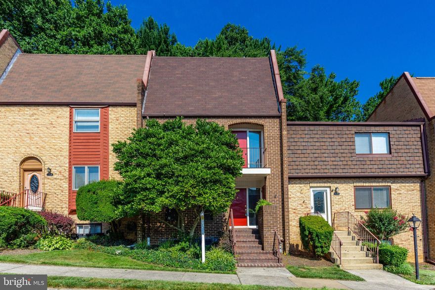 Too many updates to list all.  Gorgeous renovated kitchen with stainless appliances, 42" glass-front cabinets, hardwoods & granite counter tops. Hardwoods throughout main level with foyer, powder room, living room with brick fireplace & mantel, dining room and french doors to spacious deck with built-in seating overlooking trees & so much green! Master, guest bedrooms & recreation room have custom built-in cabinets & drawers.  Owner suite offers a private balcony. Walk-out lower level with recreation room, non-conforming 4th BR, full bath and laundry room.  New light fixtures throughout!  Amazing walkability score -- walk to Silver Line metro stations, shops, restaurants, entertainment & more!