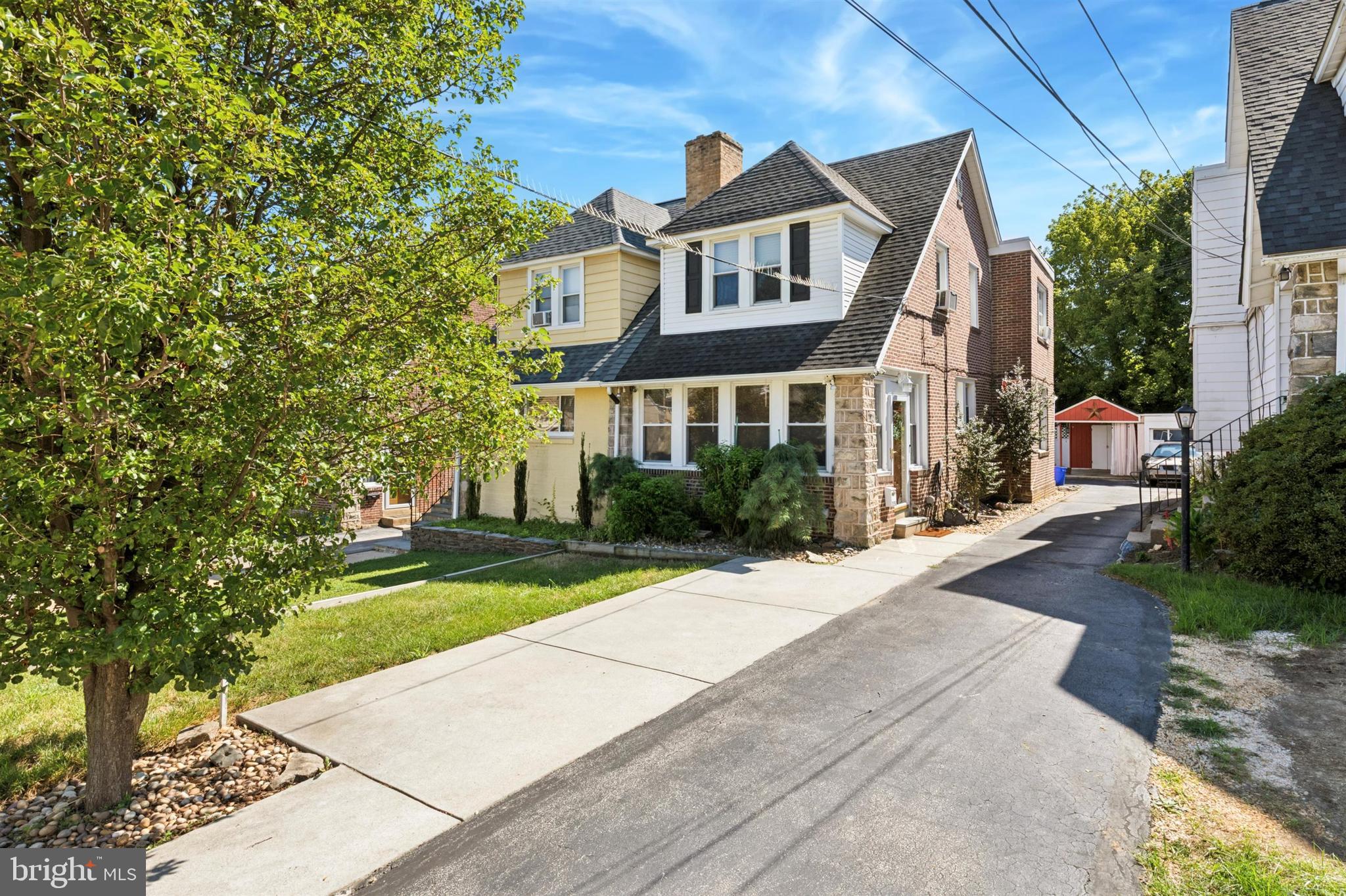 Welcome to 358 Lakeview Avenue, a beautifully maintained home in one of Drexel Hill’s most established neighborhoods. This property has been thoughtfully updated and meticulously cared for, offering the perfect blend of classic charm and modern convenience.
From the moment you arrive, you’ll notice the striking stone and brick exterior, expanded off-street parking, private covered rear parking, and a perfectly manicured lawn. Step inside and experience a spacious layout that immediately sets this home apart from a typical twin.
The main level offers a light-filled sunroom, a spacious living room with fireplace, a formal dining room, and a stunning eat-in kitchen designed with the home chef in mind. Highlights include brand new GE stainless steel appliances, gas cooking, 42” cuaromized cabinetry with beadboard accents, tile flooring and backsplash, recessed and pendant lighting, and abundant counter space.
Upstairs, the oversized primary bedroom stands out with crown molding, chair rail detail, overhead lighting, and two closets. Two additional generously sized bedrooms, a hall cedar closet, and an updated full bath complete the level.
The finished lower level adds significant living space with a cozy gas fireplace, separate laundry and half bath, multiple storage areas, and convenient walk-out access to the exterior. This is a great space to chill and escape watch the game or have friends over.
Outdoor living is equally impressive. Enjoy summer evenings on the covered, screened-in porch with privacy shades, or entertain on the rear patio and fenced yard.
Additional features include gleaming hardwood floors, fresh interior paint, updated fixtures and lighting, custom millwork, Pella windows, a newer roof, attic storage, and a brand new hot water heater.
Conveniently located near shopping, dining, and parks, with easy access to Route 1, Route 3, I-476, I-95, and SEPTA for quick commutes to Center City, the Main Line, and the airport, this move-in ready home offers unmatched quality, space, and value. Don’t miss the opportunity to make it yours—schedule your showing today!