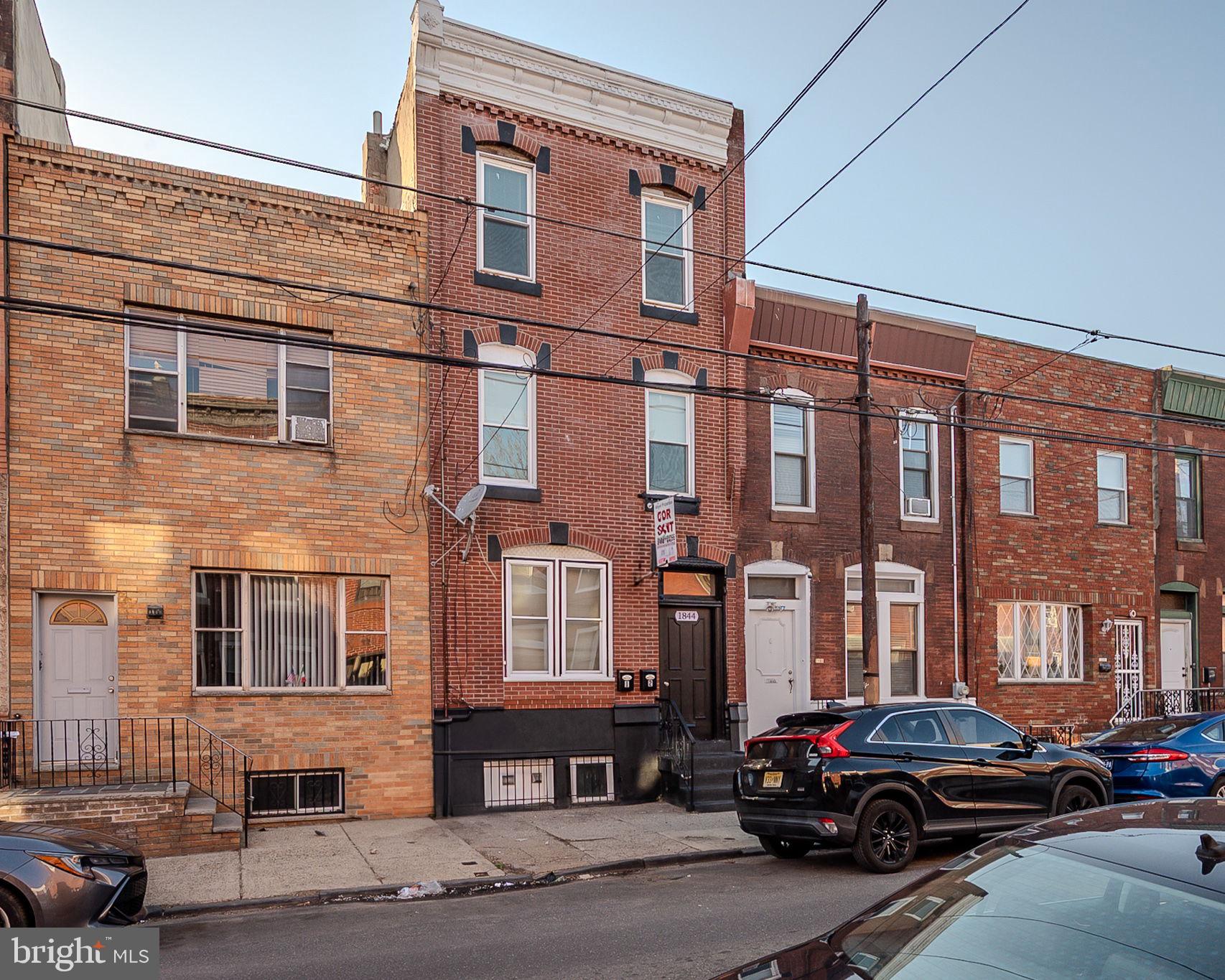 Welcome to 1844 S 16th St. This renovated duplex in the heart of South Philly offers the perfect blend of modern comfort and urban convenience. Each unit has been thoughtfully updated to provide a stylish and functional living space. The first floor features a cozy 1-Bedroom, 1-Bathroom apartment. This apartment has been upgraded with brand new cabinets, a brand new granite countertop, new paint, new flooring, and a brand new tiled bathroom. This unit also has exclusive use to the cement patio in the rear of the building. On the second floor you can find access to the large 3-Bedroom apartment, that also extends beyond to the third floor. Like the first floor apartment, this unit has been upgraded with the same or similar finishes. Both apartments also feature ductless mini split heater/air conditioners throughout, to keep the each room at the exact temperature that you want it to be. Nestled in the desirable Newbold neighborhood, this property is just steps away from some of Philadelphia's best local destinations from the culinary delights of East Passyunk Avenue, known for its award-winning restaurants, cafes, and bars, to nearby Columbus Square and Marconi Plaza that offer green spaces for relaxation and outdoor activities. Commuting is a breeze with the options such as the broad street line, multiple bus lines, and a walk score of 93. Whether you're looking for a comfortable home or a fantastic investment opportunity, 1844 S 16th St is a must-see. Don't miss your chance to own a piece of South Philly charm!