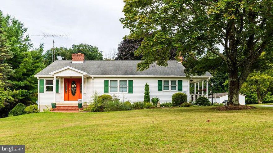 Highest and best due by 7/30/24 at 3pm.  If you are looking for peaceful living, this is it! This charming 3-bedroom, 3-bathroom rancher in secluded Parkton has everything you could want. Nestled on 1.54 acres that back to woods, this property includes a separately deeded lot, a detached 2-car garage, an inground pool, a koi pond, intricate landscaping, and 4 additional sheds.

As you walk through the front door, you are welcomed into a cozy living room with a fireplace that flows into the dining area and kitchen. Hardwood floors open up the space, creating a warm and inviting atmosphere. Just off the kitchen is a covered porch, perfect for relaxing and watching the world go by. Down the hall, the sun-filled family room leads to a maintenance-free deck overlooking the stunning backyard. The main floor also features a hall bathroom, two additional bedrooms, and a spacious, sunny primary bedroom with a massive bathroom and walk-in closet.

The lower level offers even more space with a full bathroom, a full bar area, an office space, and a huge workshop area with countless possibilities (possible in-law suite). This area opens up to the beautifully landscaped yard. Conveniently located near York Road, I-83, and Old York Road, this home has absolutely everything you need. It will go quickly, so schedule a viewing today to see it for yourself!