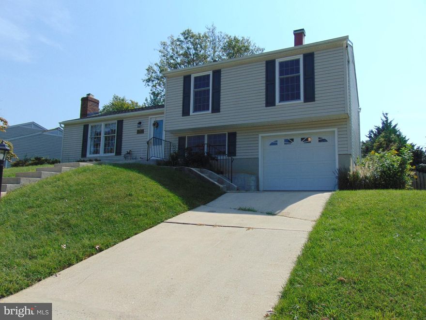New Roof -  Open Floor Plan - Located in the Desirable Nottingham Woods  Community.  Four Level Split with 1 Car Garage    New Shutters 2021.  20 x 20 Composite Deck , 17 x 20 Hardscaped Patio, Fully Fenced Yard.. Woodburning Stove on lower Level and additional Woodburning Fireplace with Heatilator on Main Level in Living Room.  Open Floor Plan,  Eat-in Kitchen,  Dining/ Living Room Combination, Master Bedroom  with Updated Vanity in Master Bathroom. House is currently all Electric and can be converted to gas. Gas pipes are in place call agent for details.. Close to major roads and shopping.