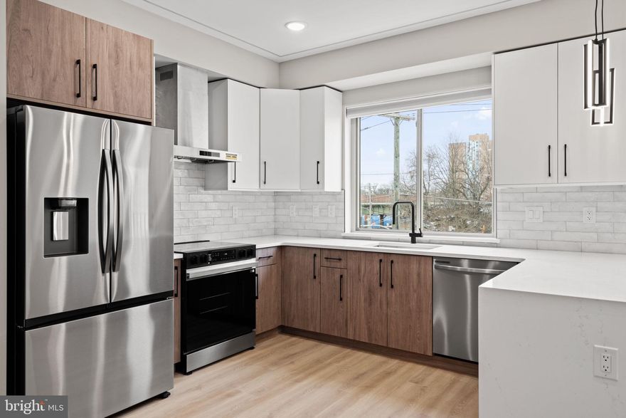 One of a kind new construction triplex located blocks from Girard Ave and Northern Liberties in the heart of booming Olde Kensington. 1413 N 8th offers an incredible opportunity for investors or owner-occupants seeking strong rental potential and luxury finishes. Each unit contains a unique finish palette and features a variety of designer lighting and plumbing fixtures, quartz countertops, stainless steel appliances, and modern open layouts with an abundance of natural light. Access to the private roof deck from the top unit provides unobstructed views of the Center City skyline. This offering is further enhanced by a 1-year builder warranty and a full 10-year tax abatement. Surrounded by thriving new development, vibrant retail and dining corridors in Northern Liberties and Fishtown, and just steps from one of the city’s newest pickleball and padel clubs, 1413 N 8th represents a standout investment in one of Philadelphia’s most dynamic and evolving neighborhoods.