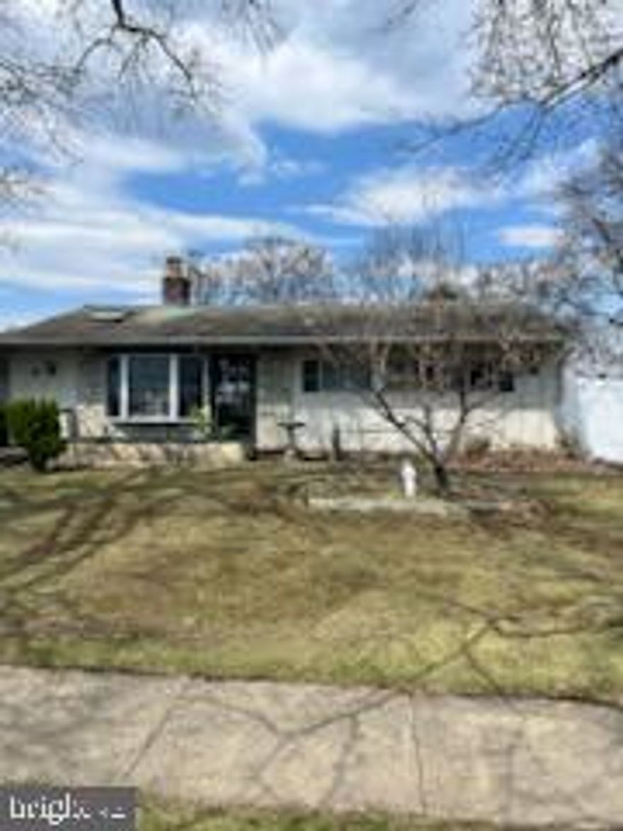 Great Opportunity !  This 3 bedroom home offers you the chance to do your own updates . Open floor plan with fireplace between living area and Kitchen . The screened porch in rear looks over large yard.   Central air too! Great location in Farmbrook neighborhood.